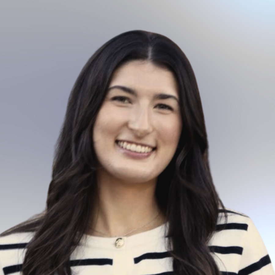 Headshot of Megan Loranger dark hair, wearing a white & black striped shirt