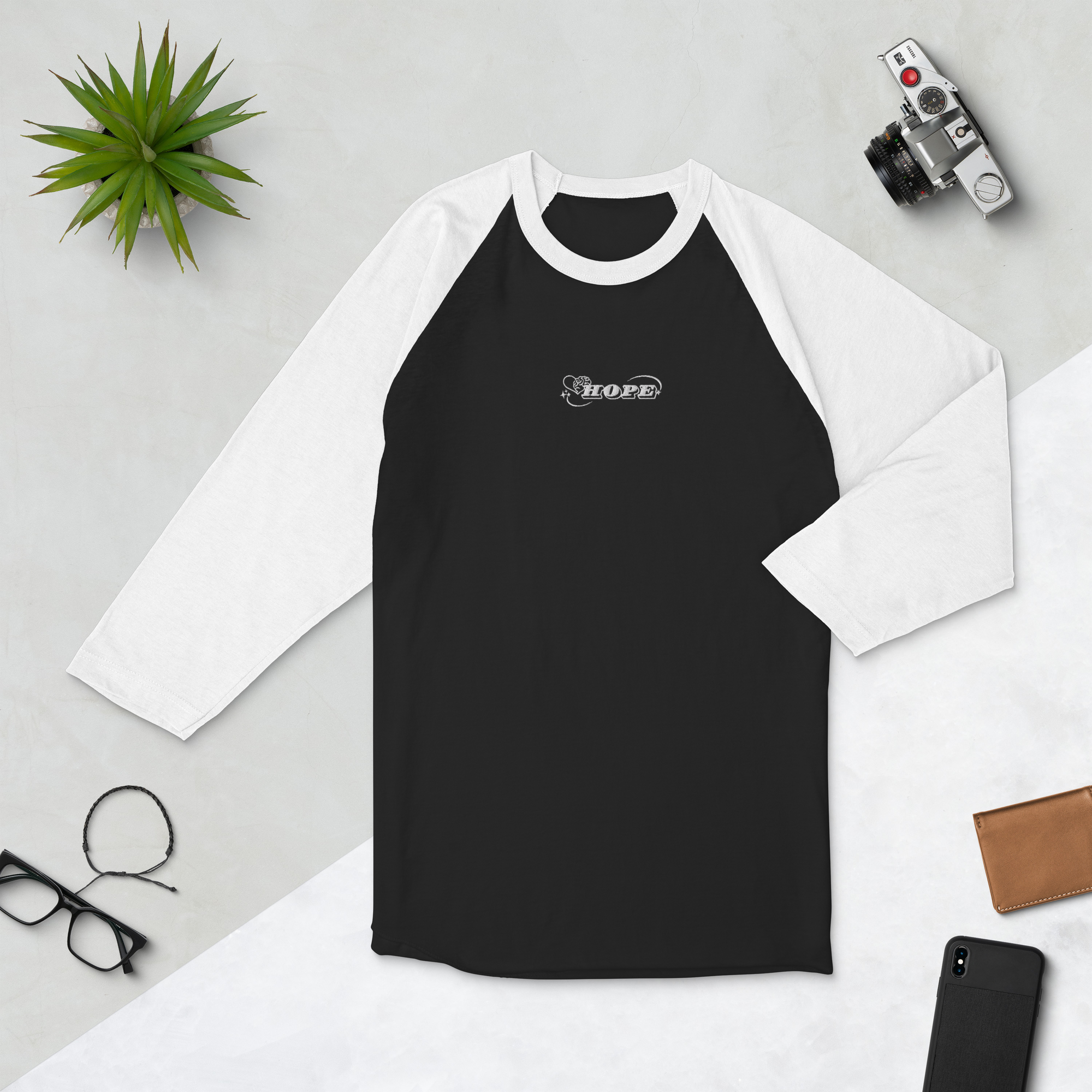 unisex-34-sleeve-raglan-shirt-black-white-front-6994e5f3dd8da.png