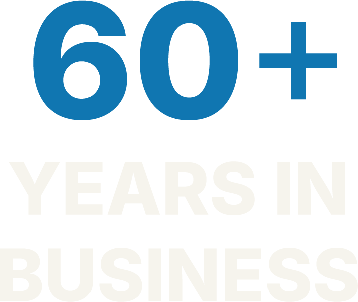 Text graphic that says '60+ YEARS IN BUSINESS' with '60+' in large blue font and the rest in white.