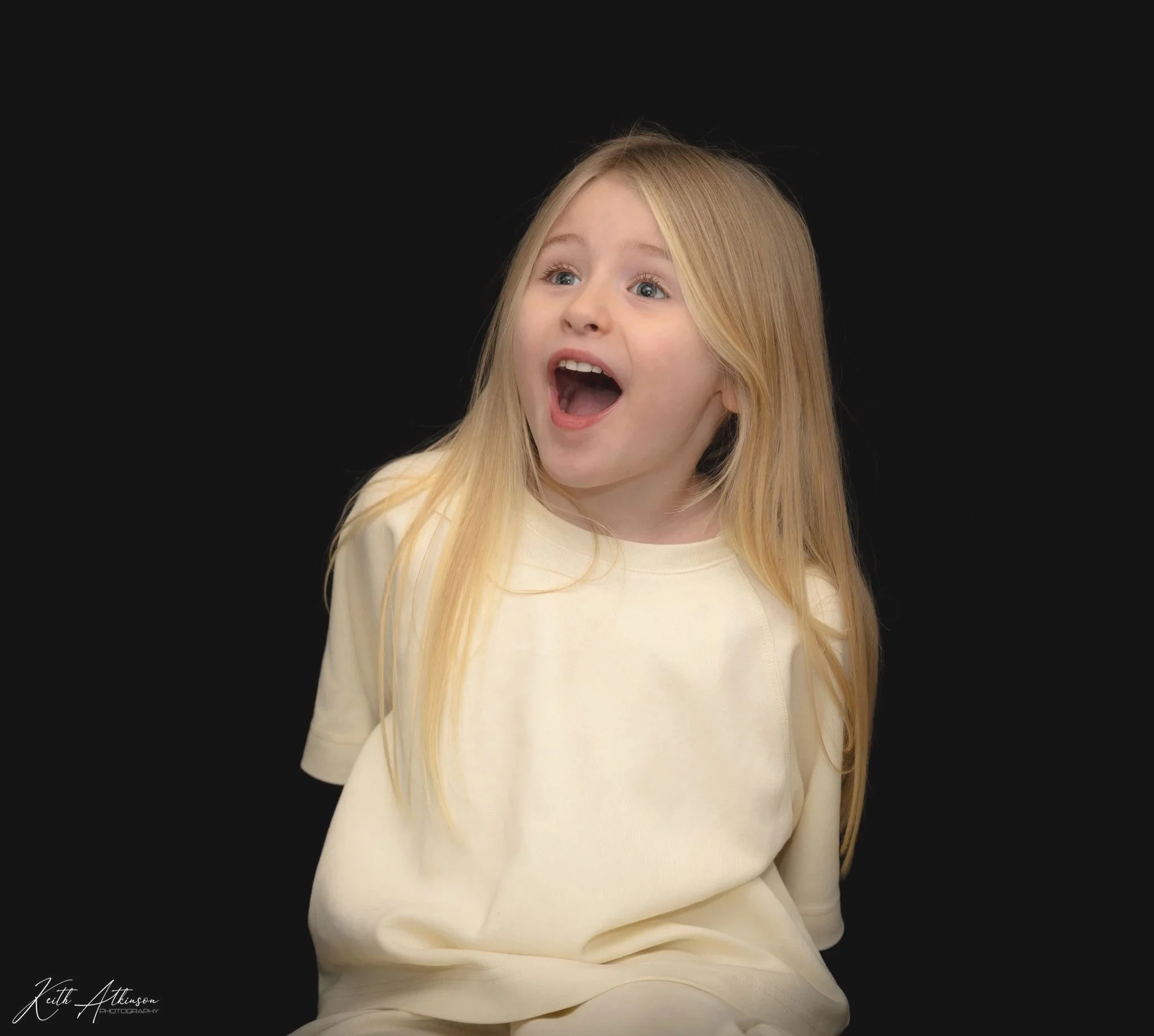 Blonde girl posing for a photoshoot