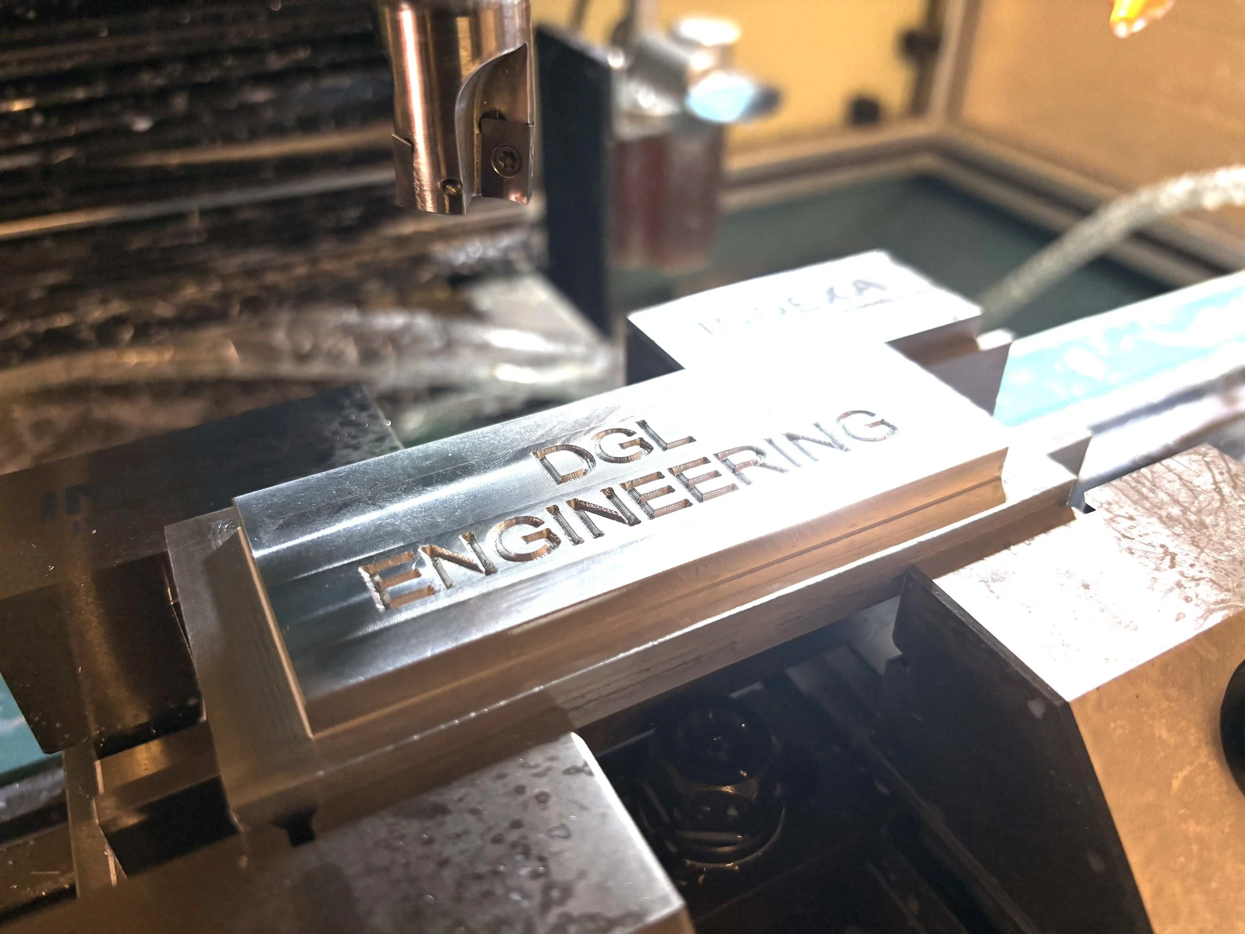 CNC milling operation machining a precision metal part on a SIEG iKX3 mill, producing accurate features for prototypes and small‑batch production in Northamptonshire.