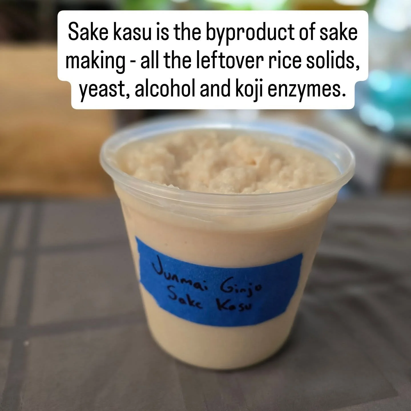 Sake kasu is the byproduct from sake making. When you filter the final sake, you're left with the remaining rice solids, koji enzymes, yeast, and alcohol that didnt end up in the filtered sake. 

This byproduct never goes to waste! It's a great pickl