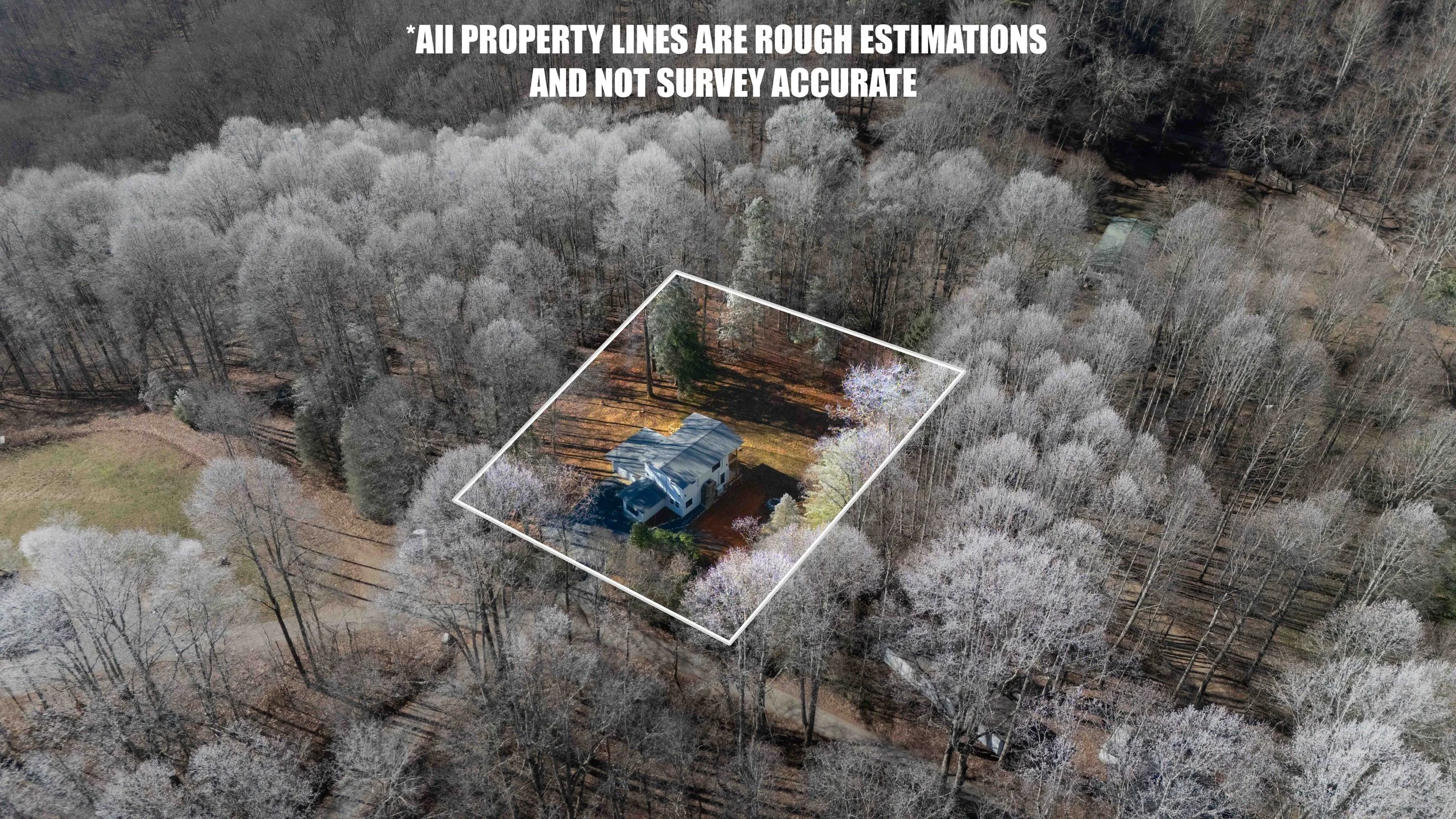 Aerial view of a house surrounded by a wooded area with property lines marked, and a disclaimer at the top stating property lines are rough estimates and not survey accurate.