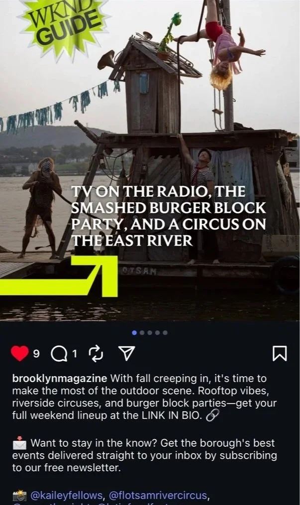 A floating house made of wood on a river, with children playing. One girl is hanging upside down from a swing with a red shirt, another child stands on the house's roof, and a third child standing on the ground is looking up.