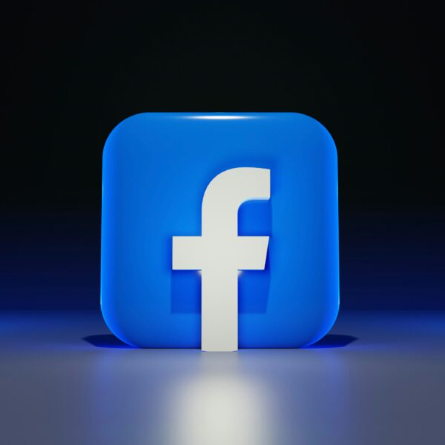 Facebook logo on a blue 3D icon.