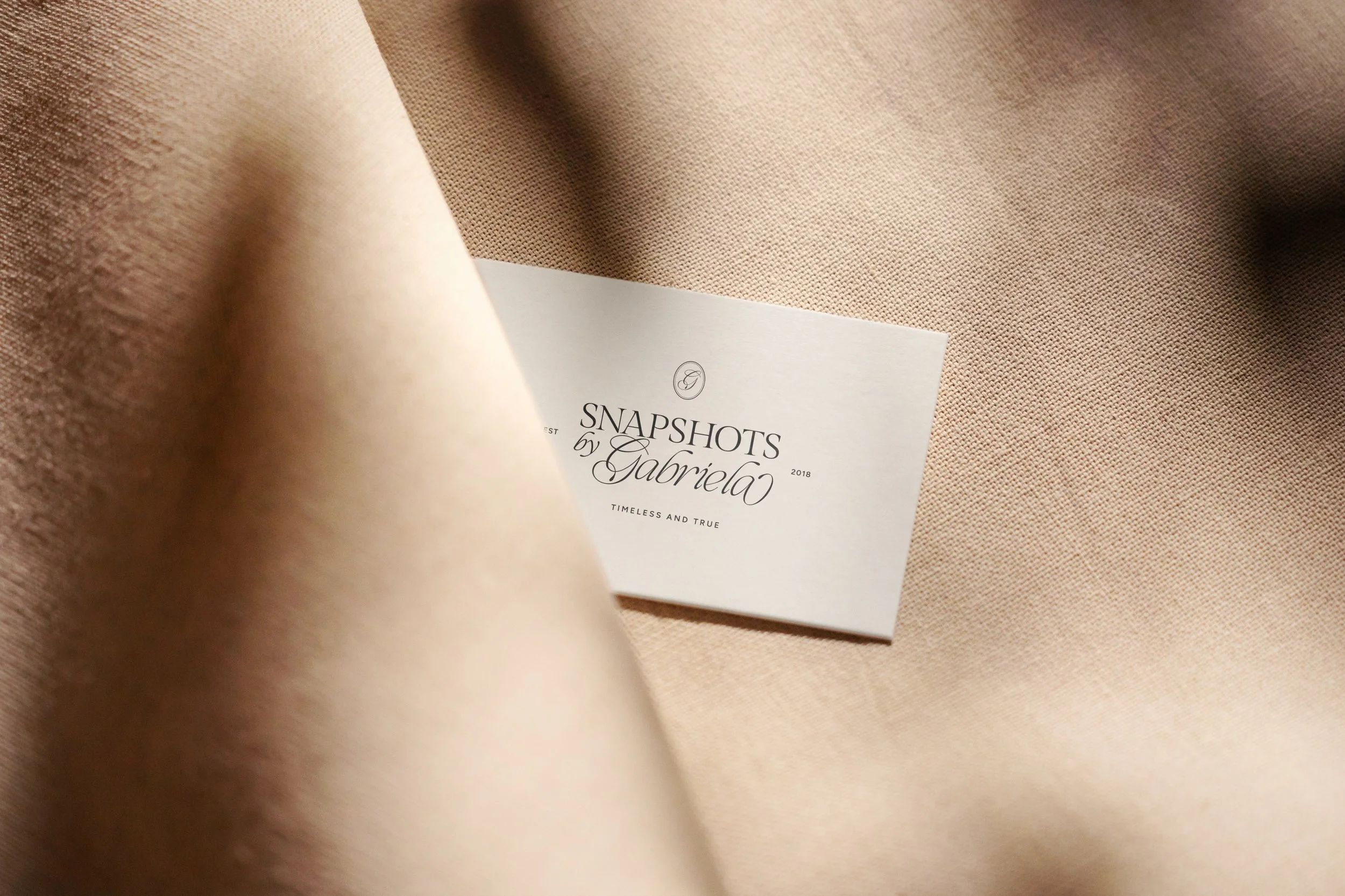snapshots by gabriela business card mockup.jpg