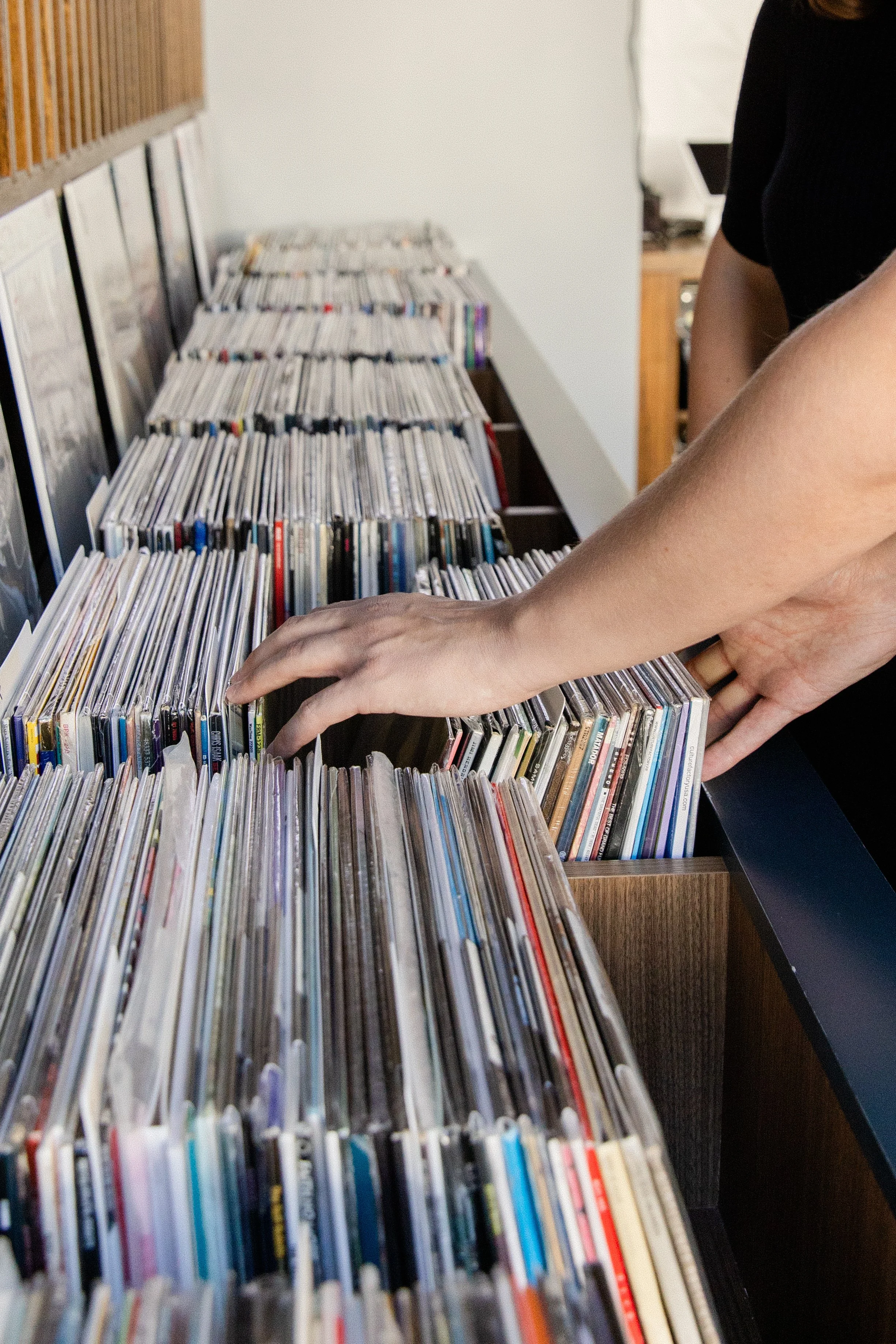 Photo of Chris Arns, marketing manager in Newfoundland, sorting through records