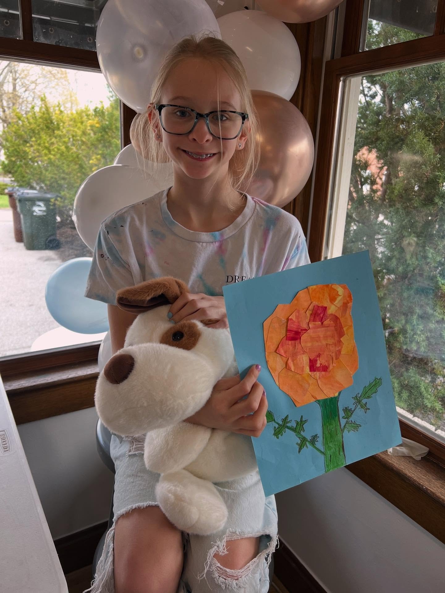 Say hello to our blooming artist! 
We created these mixed-media marigolds celebrating the rebrand of the art studio. Starting with painting bold squeegee paper, then each petal was carefully cut out and constructed into the marigold form. We added a 