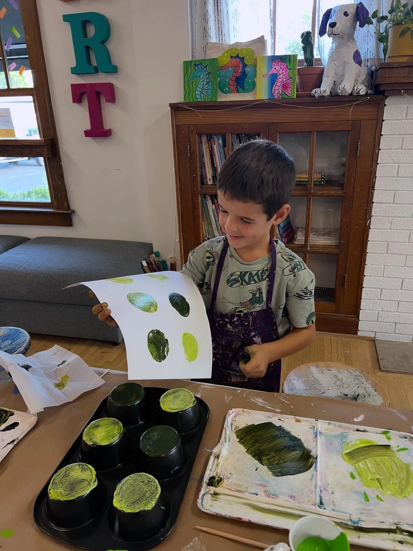 We kicked off our Marigold Makers season with a fun process-art project exploring printmaking! Each artist created monochromatic monoprints using the backs of cupcake tins &mdash; choosing a single color to explore tints and shades by mixing black an