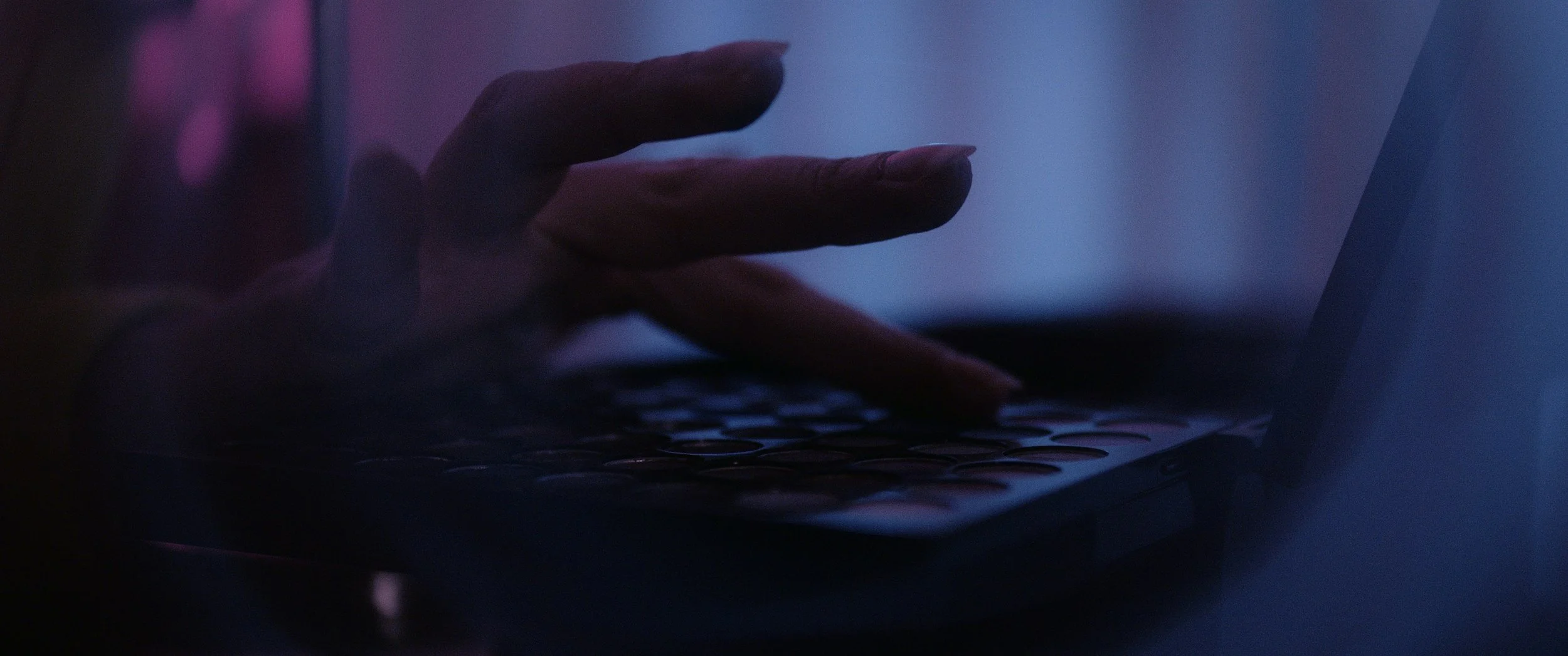 Geometric drawing of an outline square with sections divided by vertical, horizontal, and circle lines.