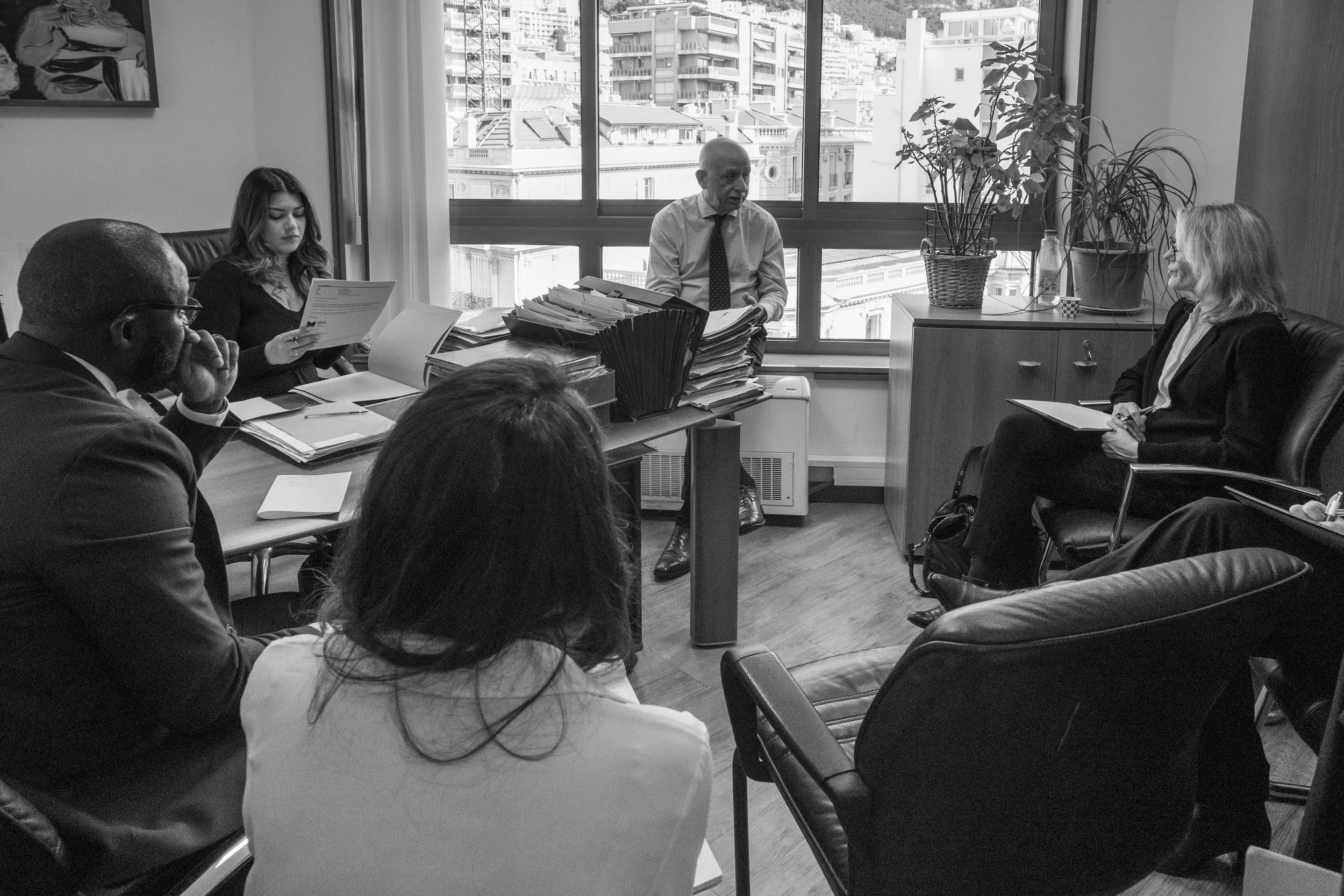 Donald Manasse Law Offices team in a meeting