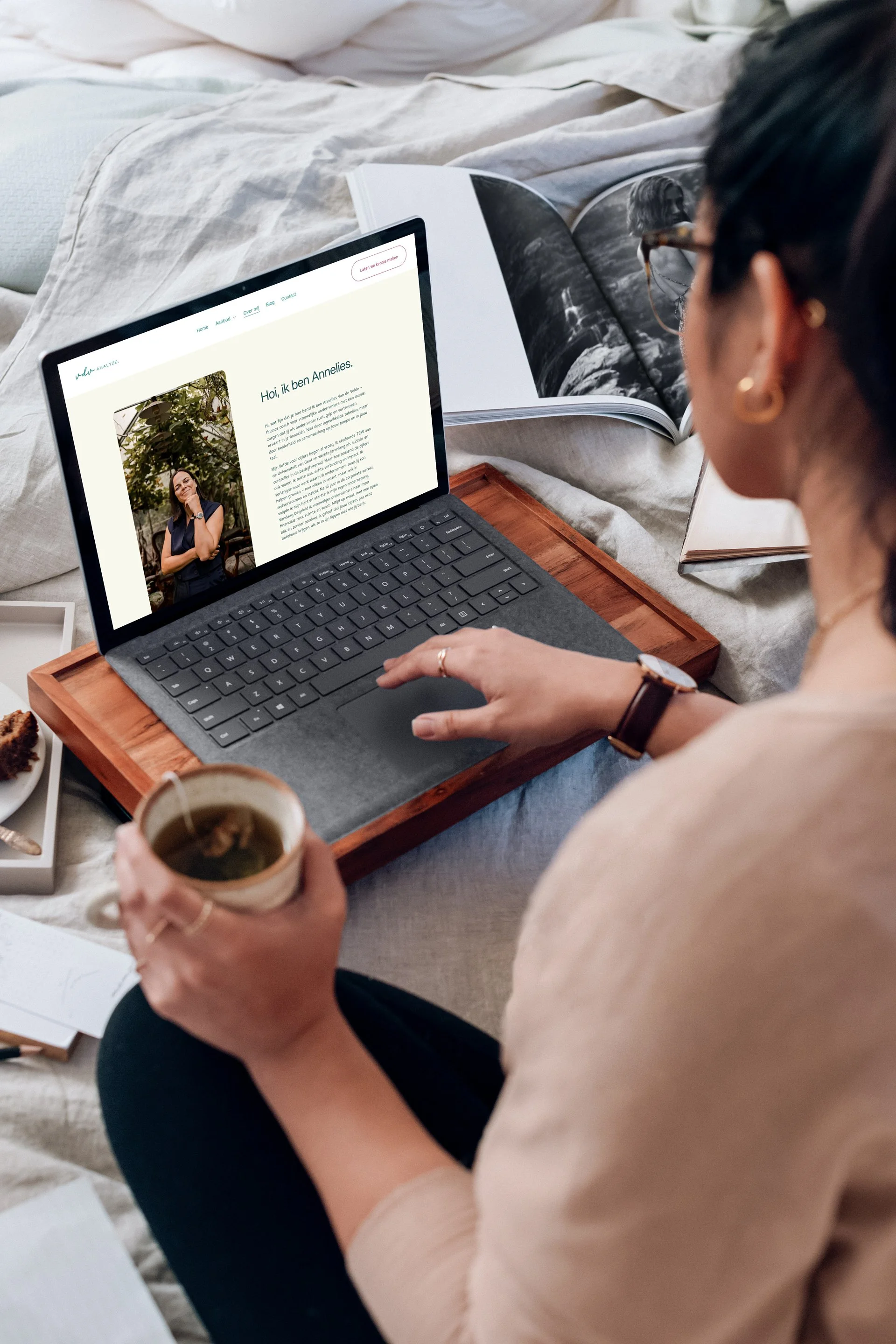 mockuuups-microsoft-surface-laptop-mockup-used-by-a-lady-on-a-wooden-slab-vdv-analyze-01.jpeg