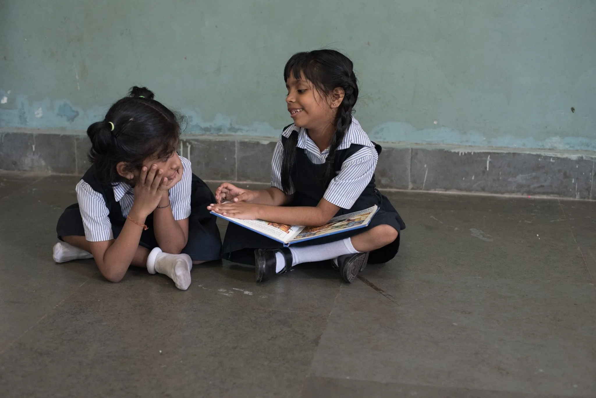 2 schoolgirls cross-legged 2017.jpg