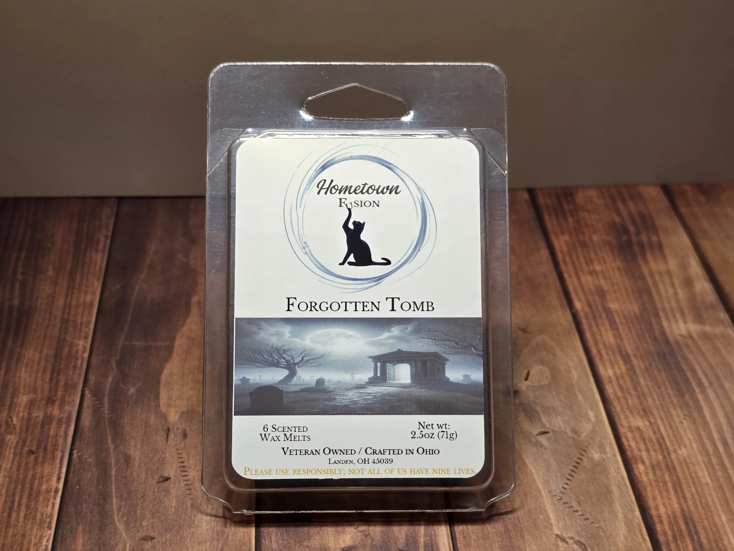 Package of Forgotten Tomb wax melts with a picture of moonlit graveyard.