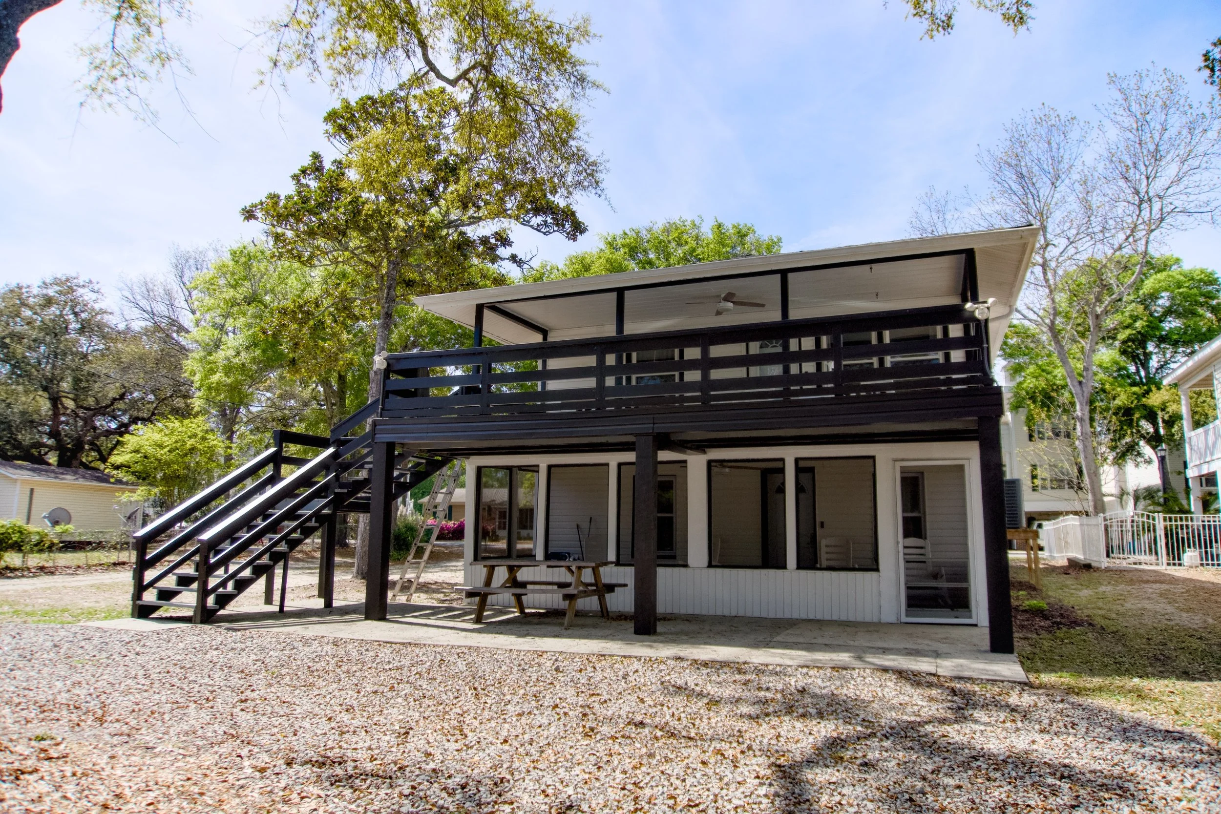 In progress photo of beach house house being painted