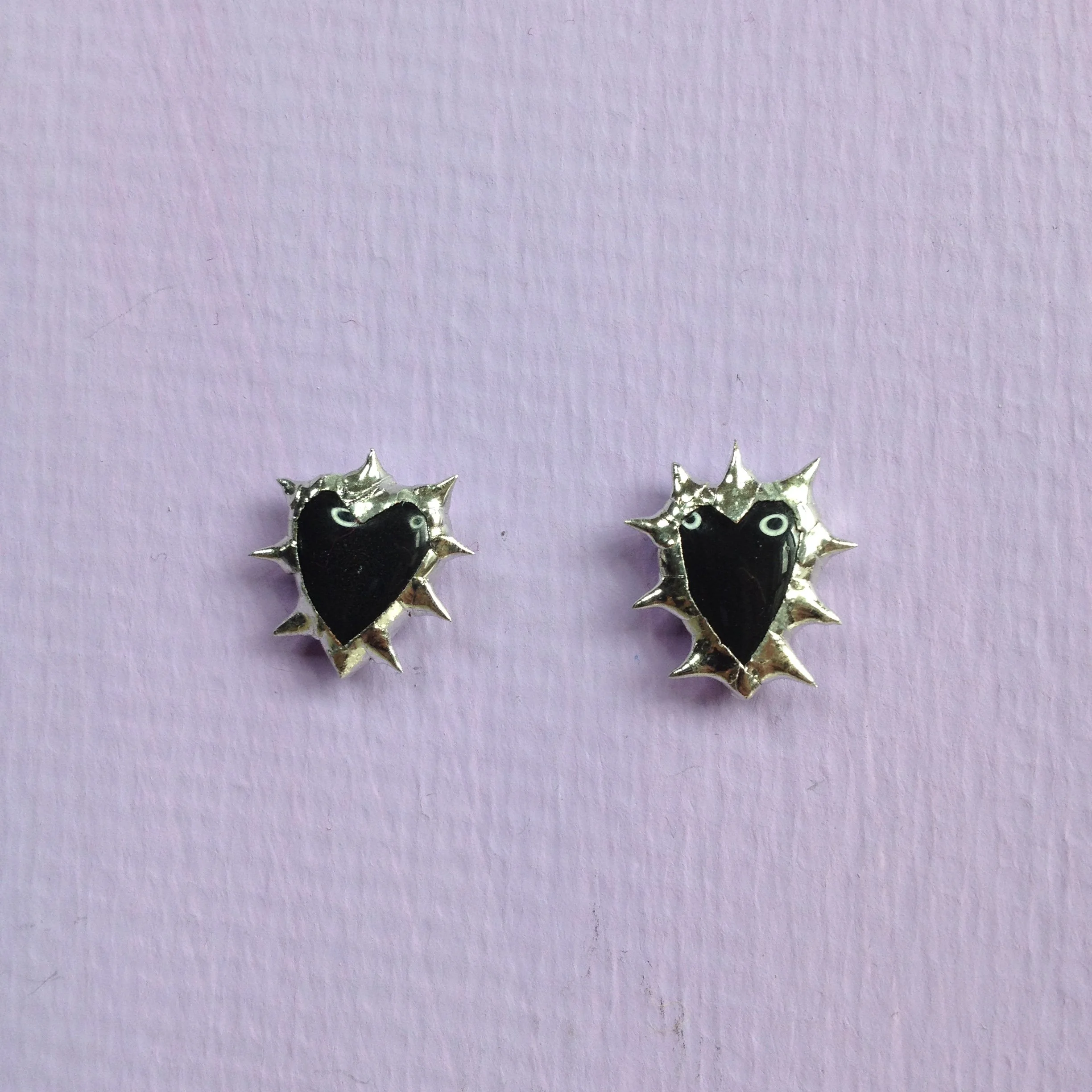 Black spiky heart earrings