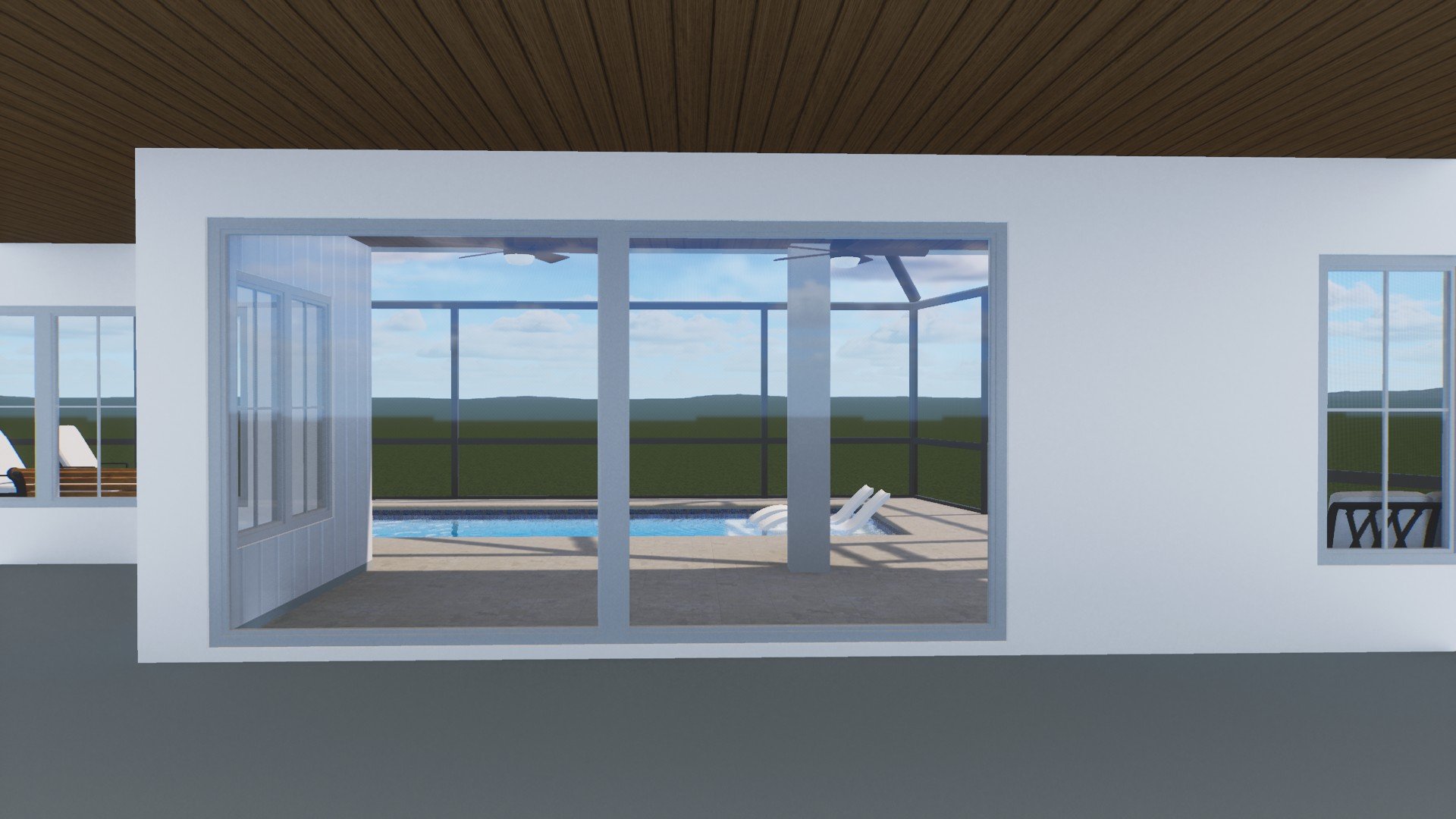 View of a screened-in pool area with lounge chairs and a small pool, seen through large glass sliding doors in a modern house with a white exterior.
