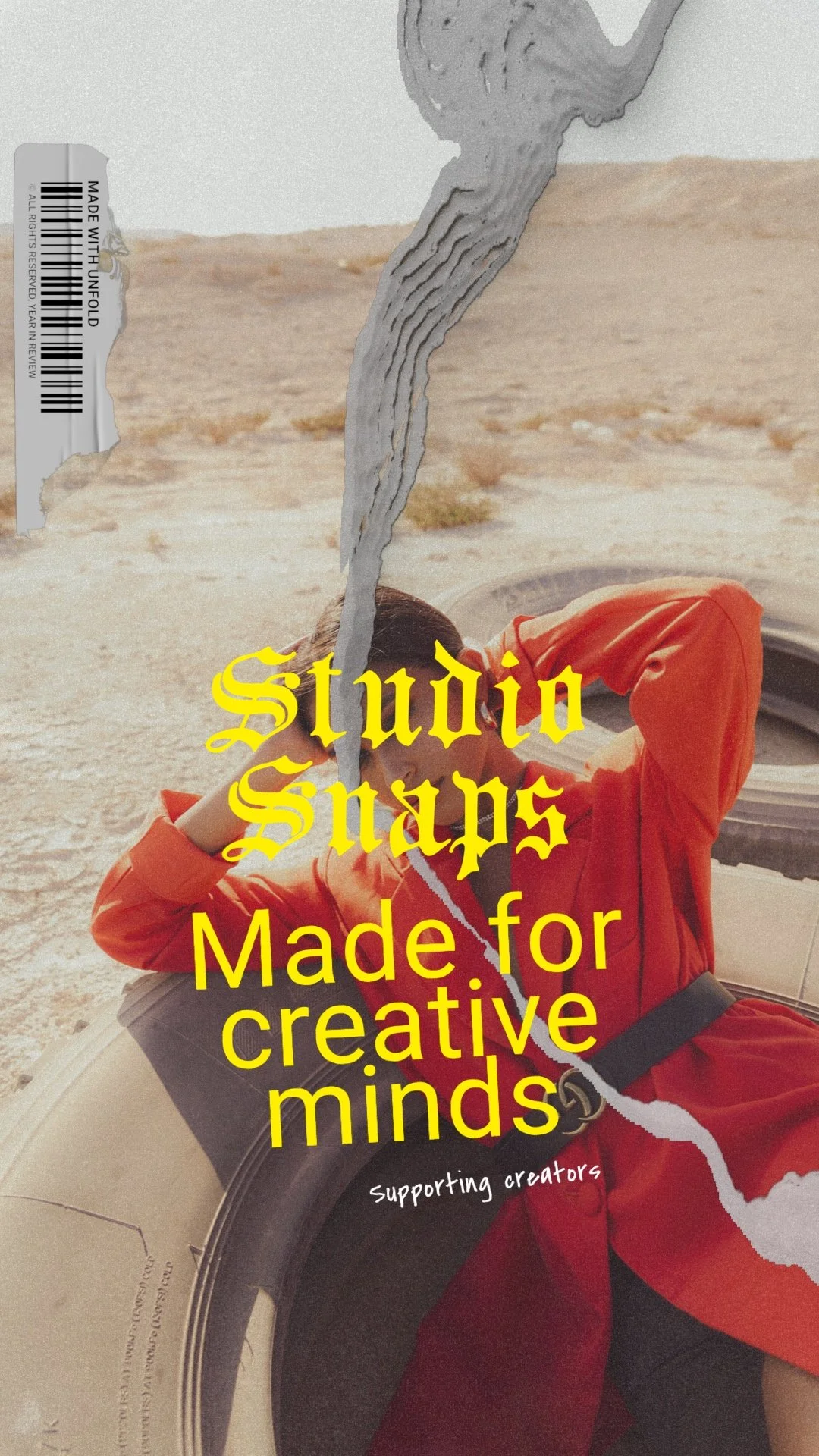 A person in a red shirt reclining on a tire in a desert setting with text overlay: 'Studio Snaps Made for creative minds supporting creators.' Gray abstract overlay and vintage-style design elements add an artistic touch.
