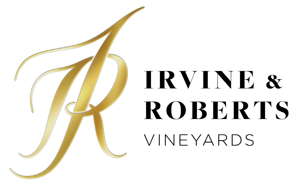 Logo with gold stylized letter with black outlined green rectangles and black text