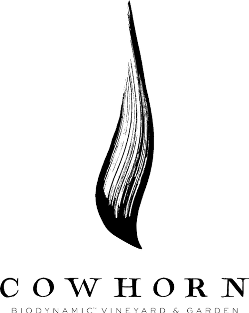 Close-up of a cowhorn logo with the text 'Cowhorn Biodynamic Vineyard & Garden' below.