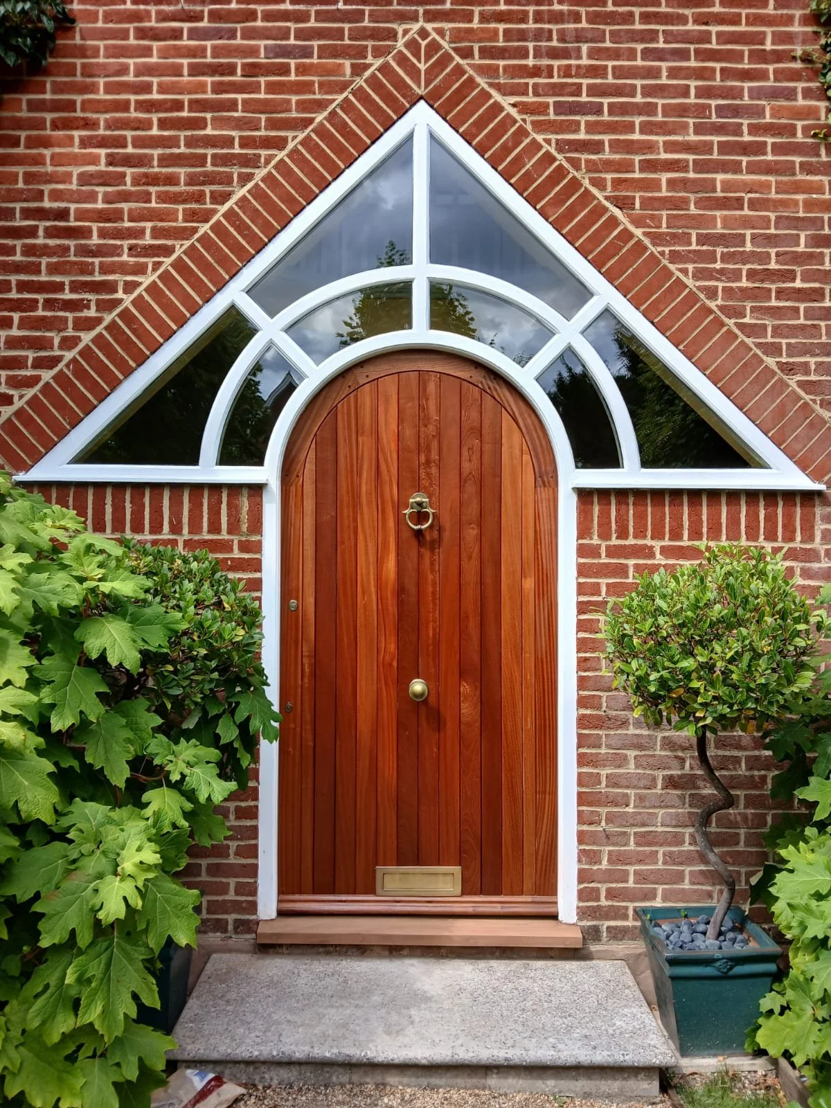 A local client was after a replacement for their existing arched front door and contacted us. We took on the project and produced this arched Sapele external door.