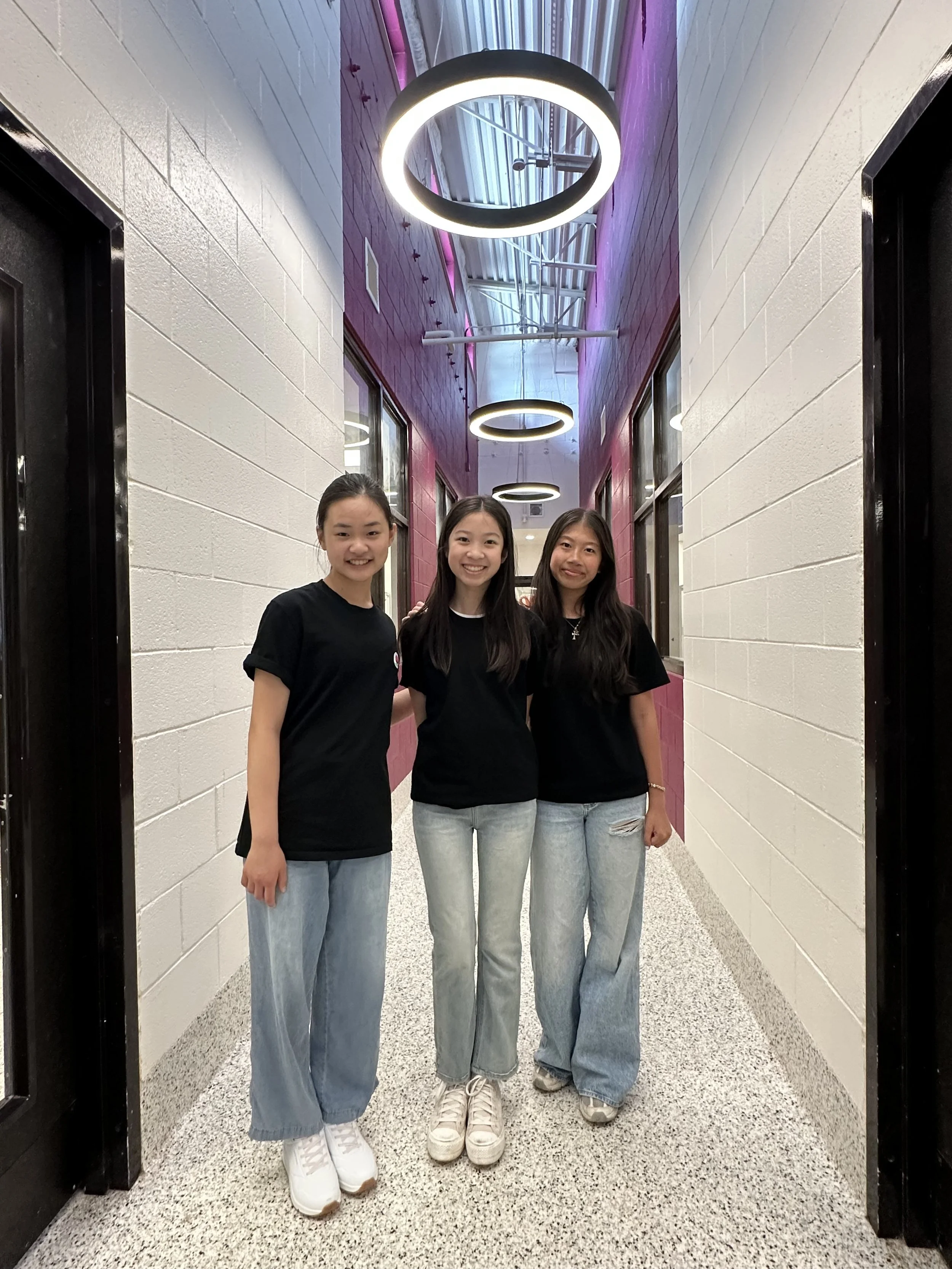 Sophia Zhan, Sophie Xue, and Emily Tan at Fulton Animal Services, representing the Better Tomorrow Organization Inc.