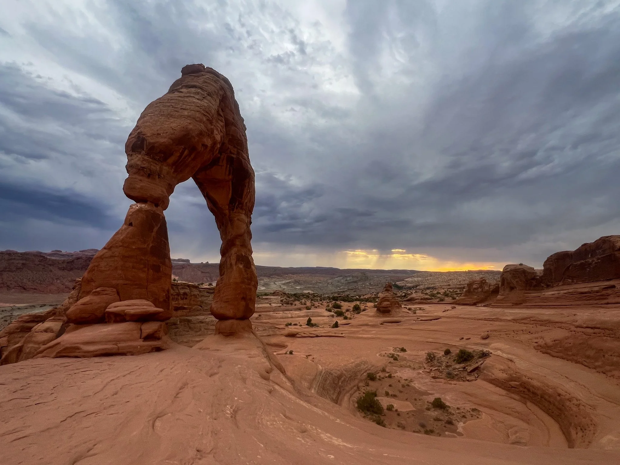 Delicate Arch at sunset along the top arches in Moab