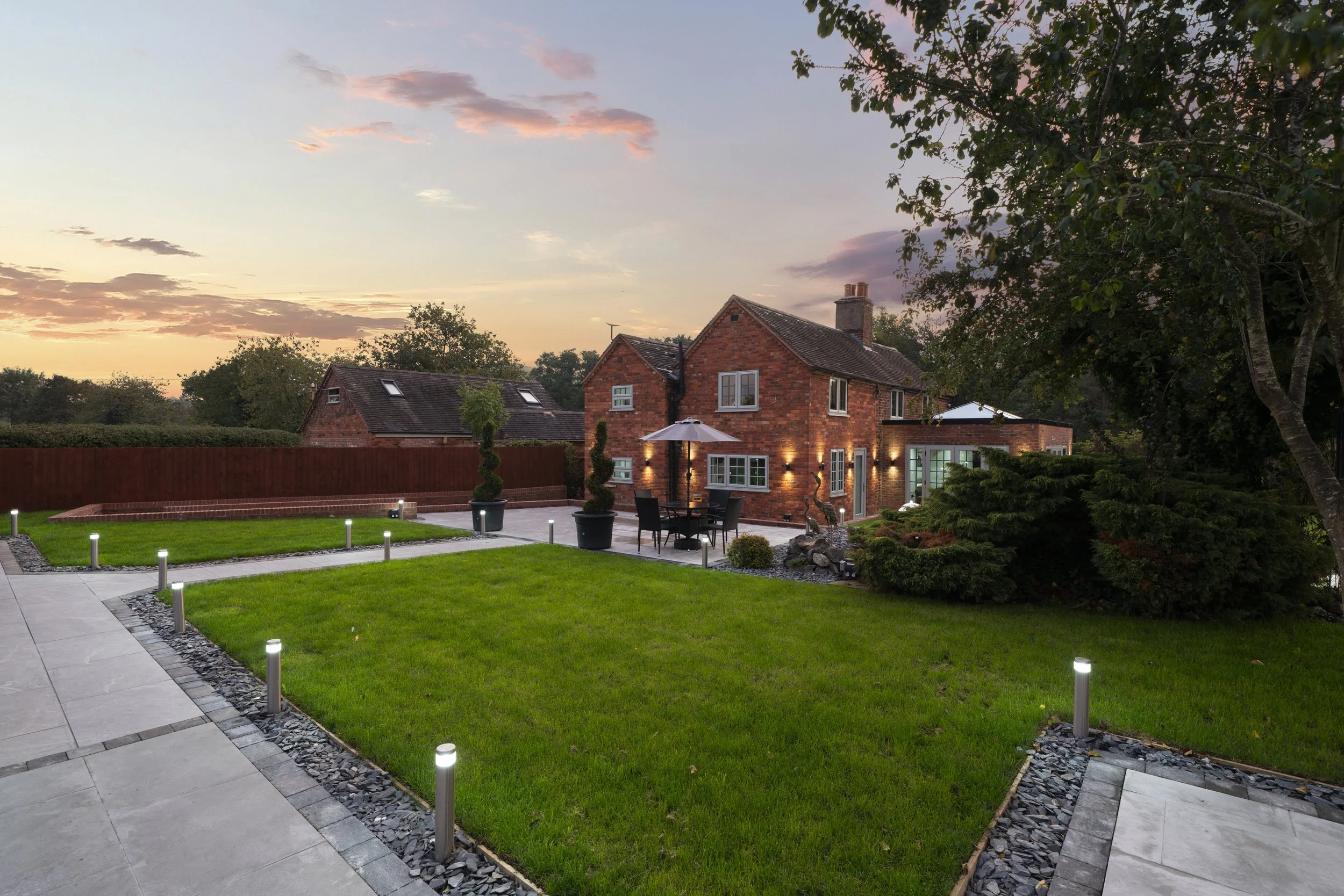 Garden seating area at Blacksmith Cottage