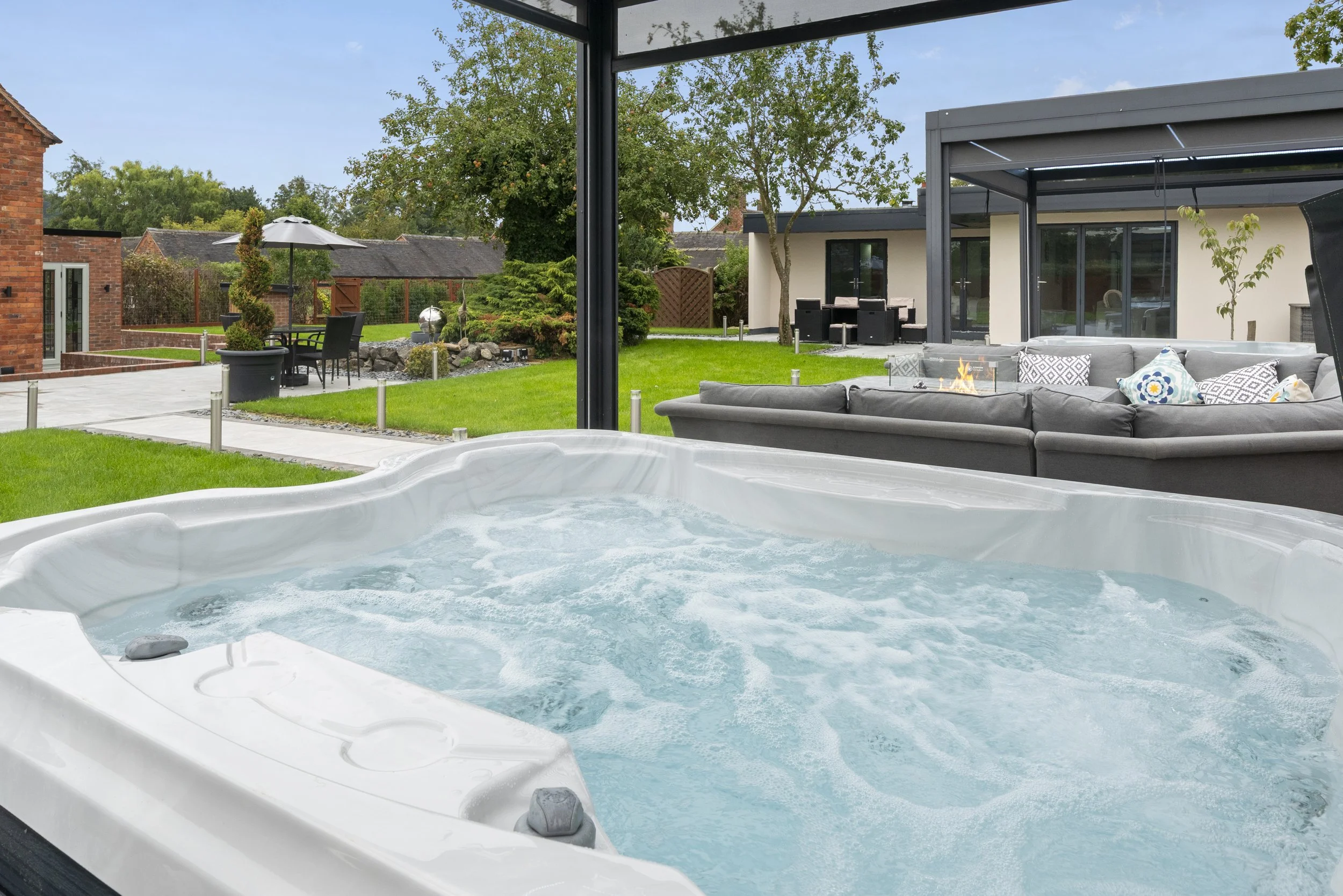One of two private hot tubs at Blacksmith Cottage