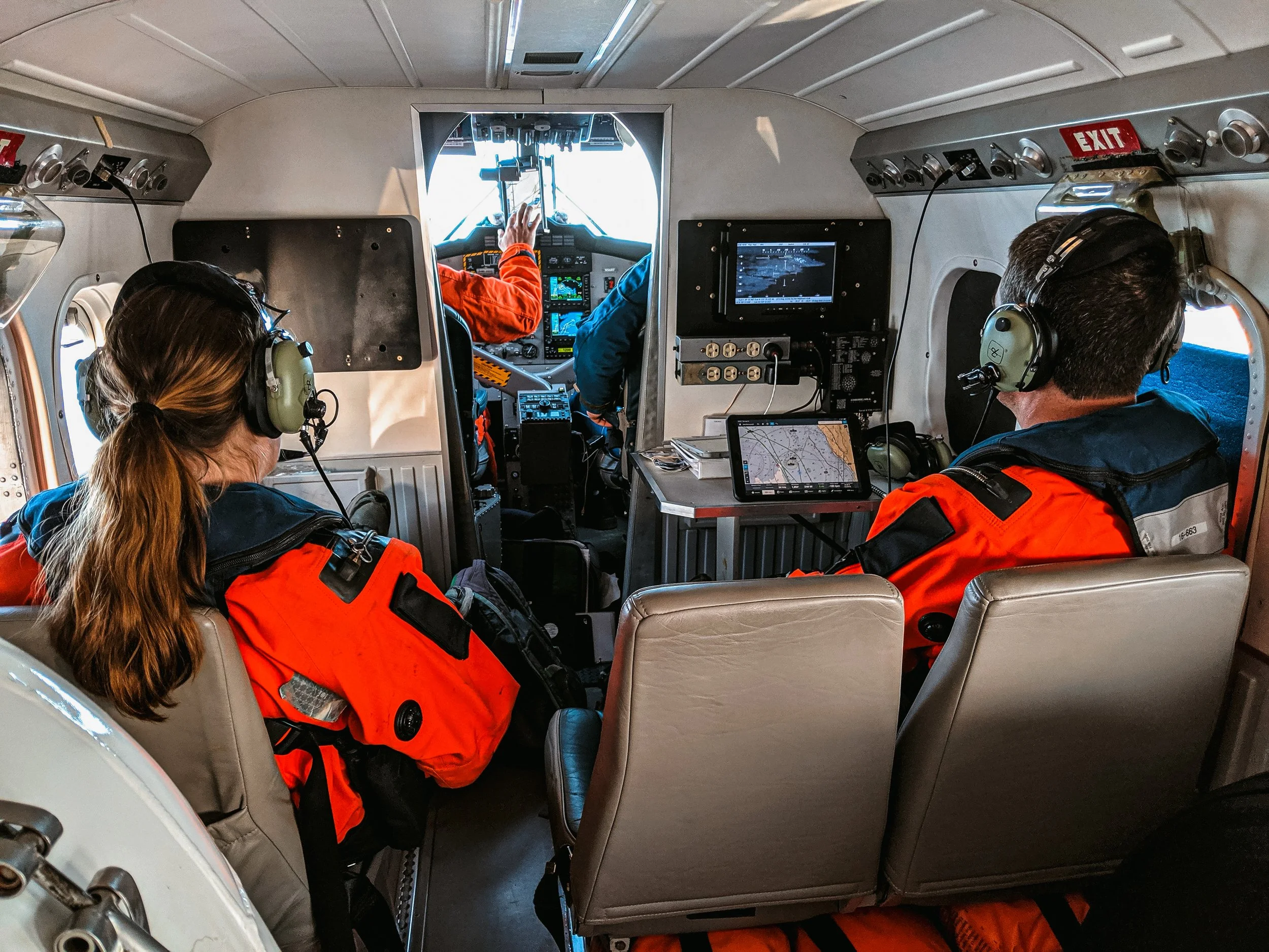 Scientists in NOAA Twin Otter N56RF during AK Harbor Seal Mission credit NOAA.jpg