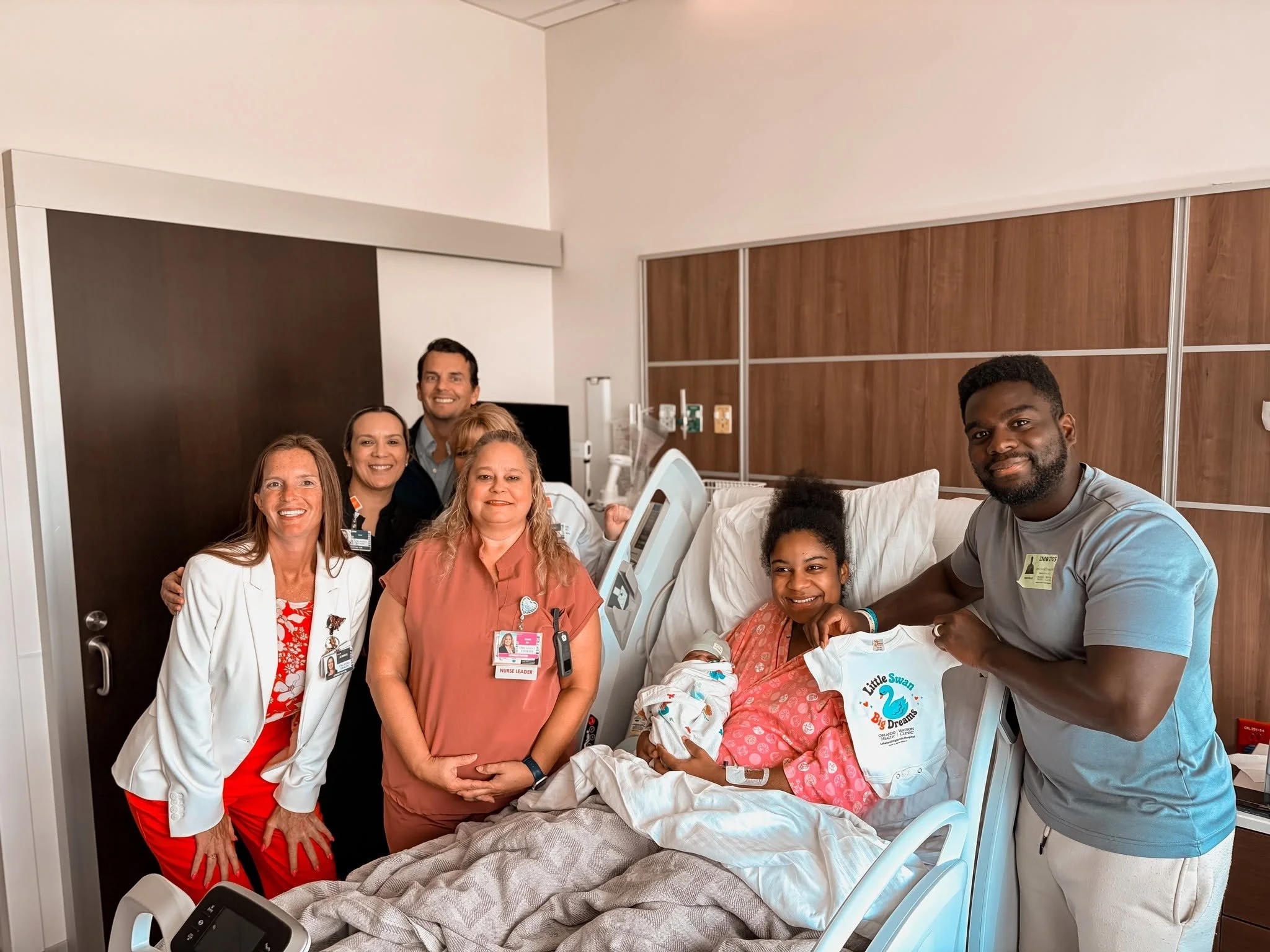 A Blanket and a College Scholarship for the First Born at New Hospital