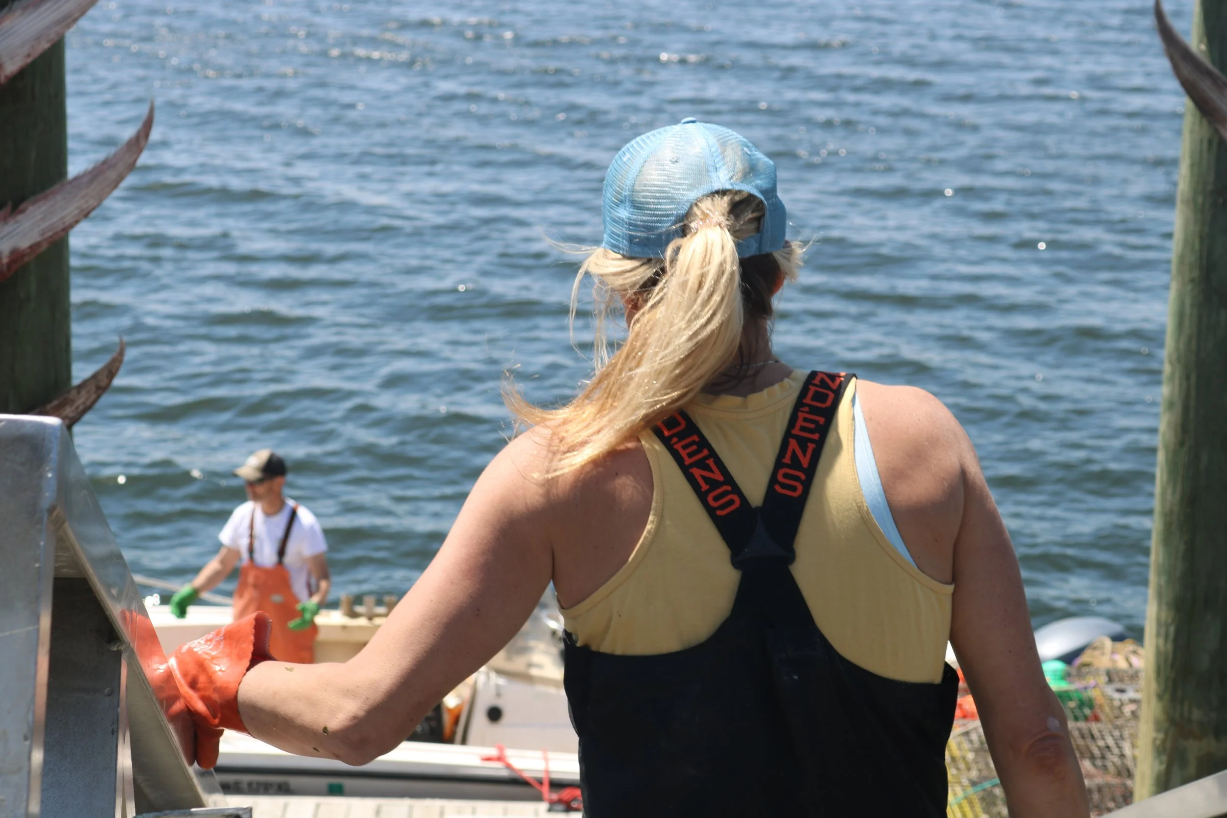 Potter taking a break from loading her truck with kelp.JPG