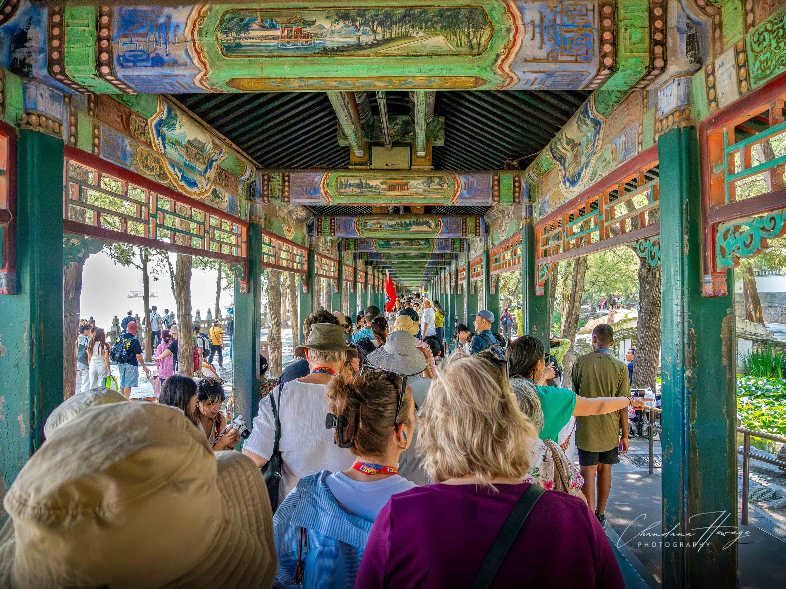 The interior of the world-famous Long Corridor (Changlang), a magnificent architectural structure along the northern shore of the Kunming Lake at the foot of the Longevity Hill.
The total length is 728 meters (2,388 feet). It holds the Guinness World