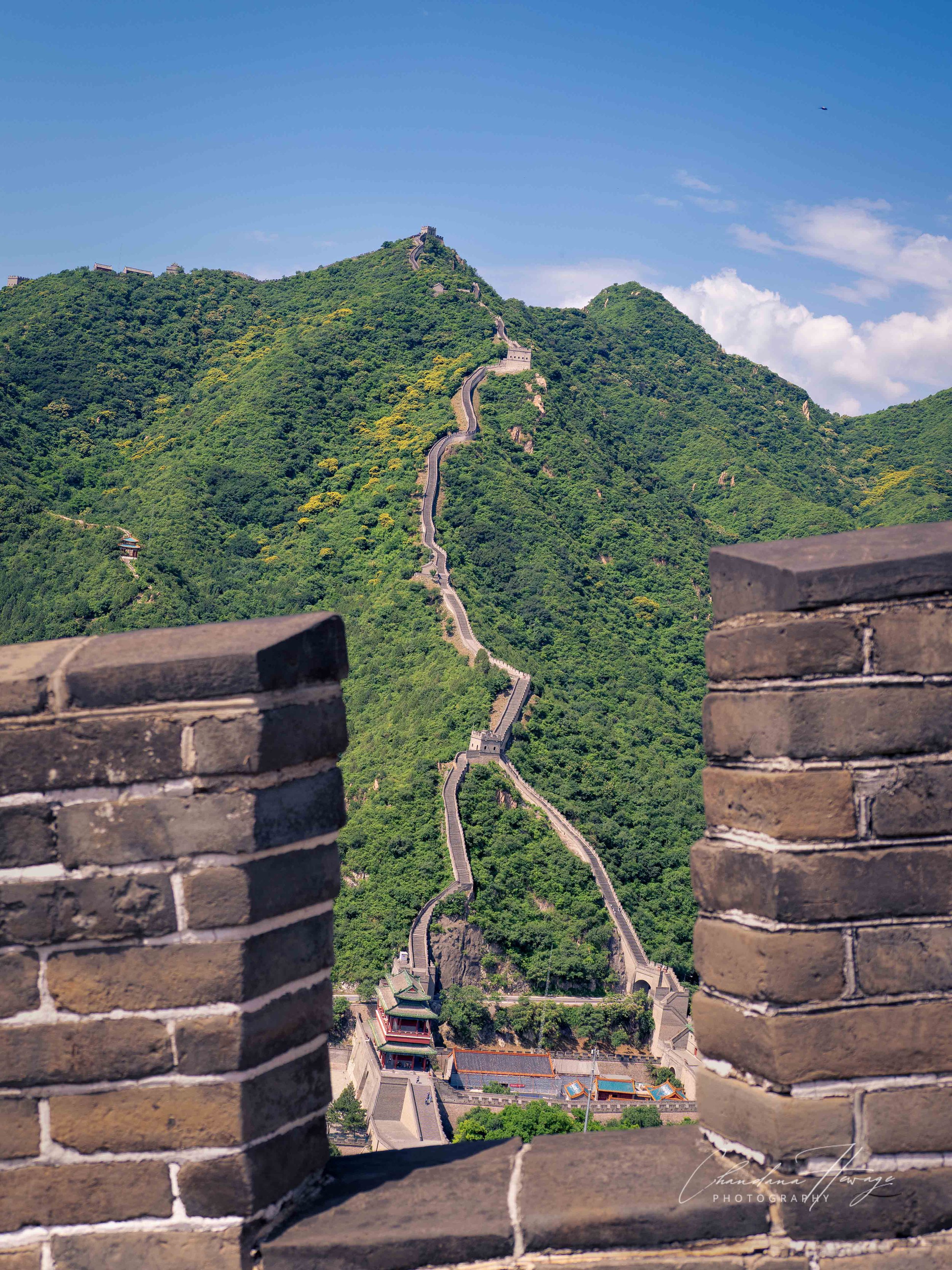 A magnificent view of the other parts of the Great Wall from the top of the East Mountain.