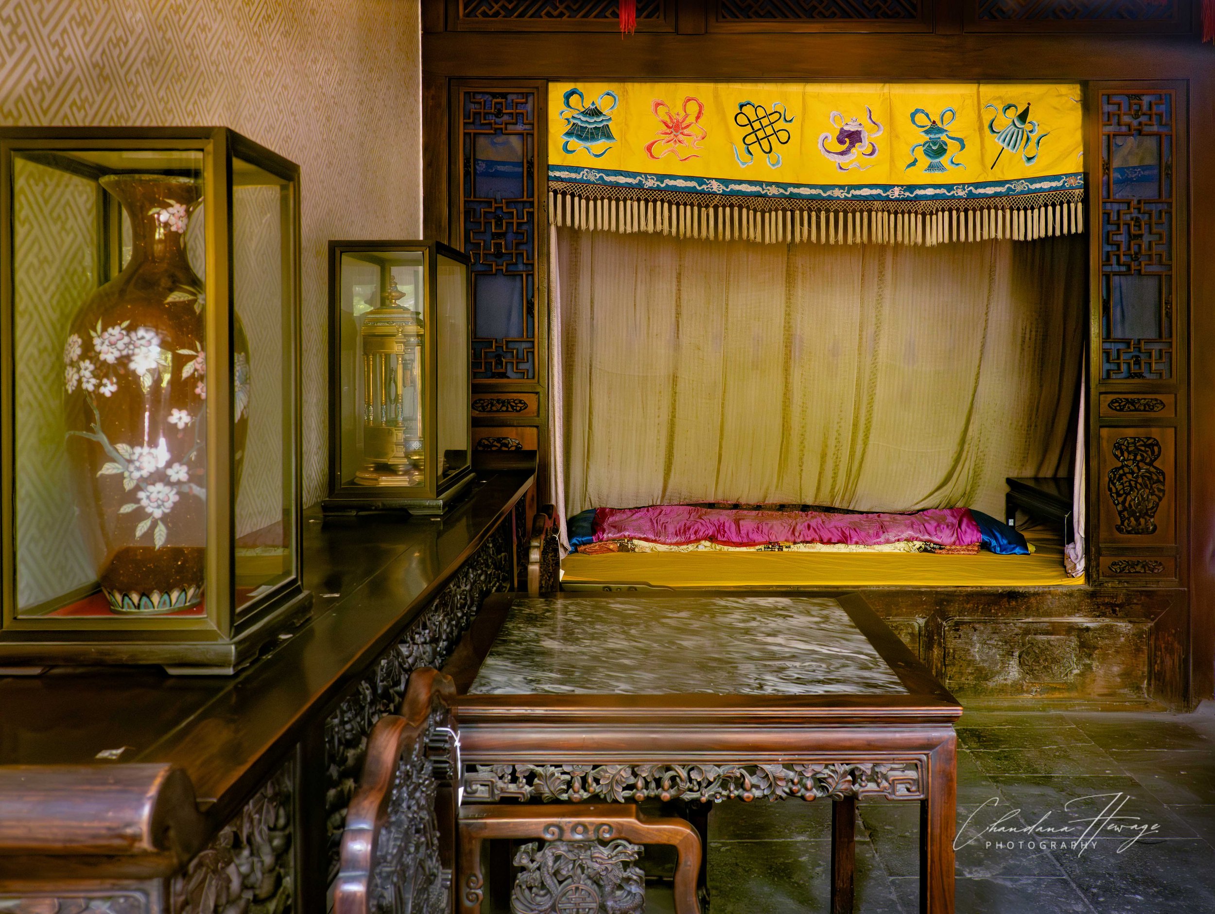 The intimate Imperial Bedroom, used by Empress Dowager Cixi (The Dragon Lady). This is located in the private residential quarters of the Summer Palace: The Hall of Happiness and Longevity.