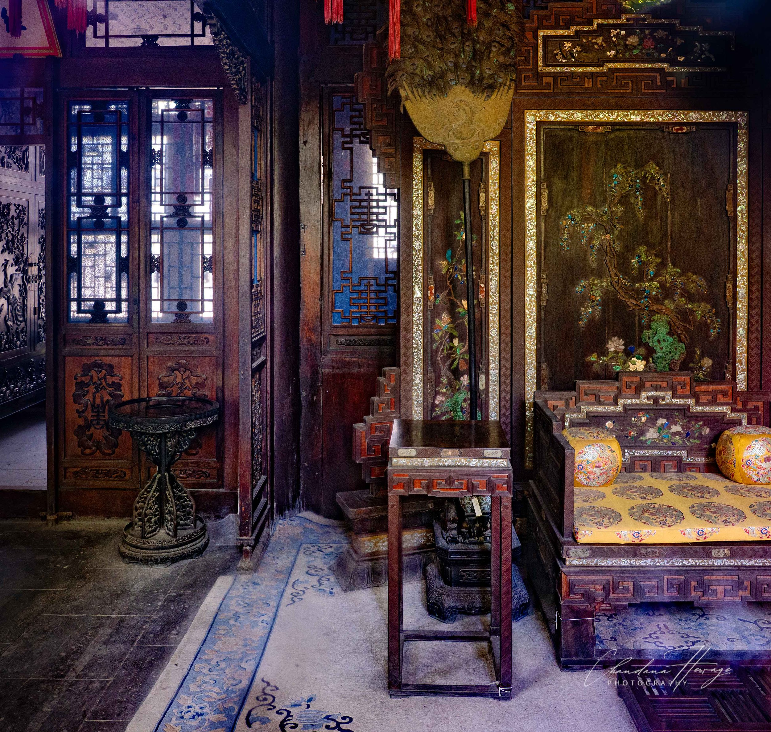 A part of the Throne Room inside the Hall of Benevolence and Longevity. (I shot this through dirty glass enclosing the interior. Visitors were not allowed inside.)
The interior is a showcase of late Qing Dynasty court art.