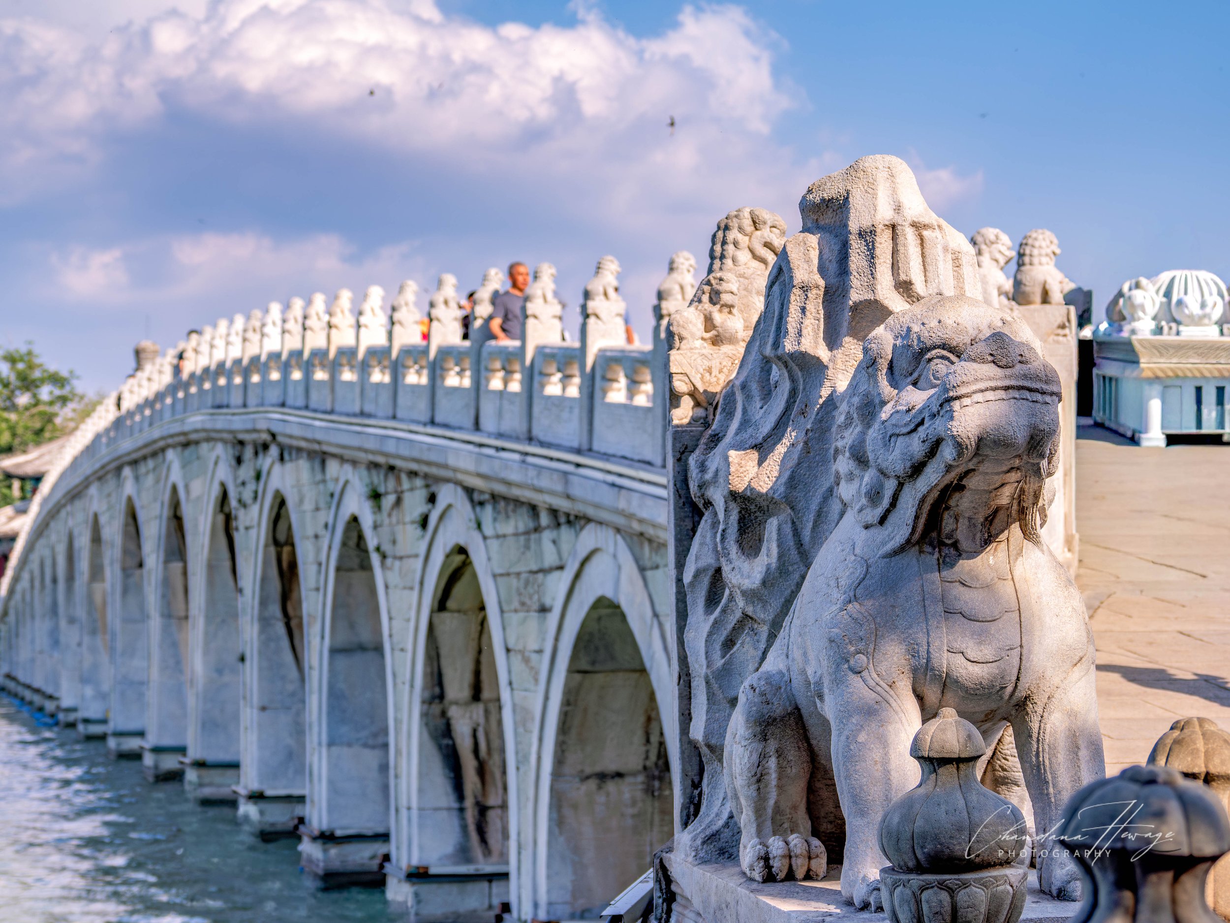 The famous Seventeen-Arch Bridge (Shiqikong Qiao), the largest and most iconic bridge within the Summer Palace. It spans Kunming Lake, connecting the eastern shore to South Lake Island (Nanhu Dao).
