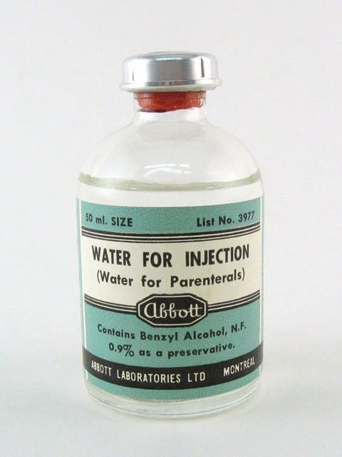A solution of water and benzyl alcohol, this liquid was often used to dissolve other medicines. Those medicines could then be safely injected into a patient. This particular example comes from Montreal circa 1970 (Accession Number 199838).
