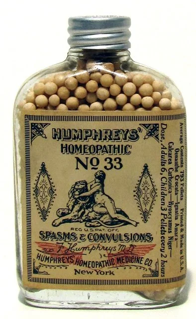 A glass bottle of Dr. Humphrey's Homeopathic No. 33 pills. Dating from the end of the 19th century, these pills claimed to cure spasms and convulsions with a dosage of six pills every two hours (Accession Number 014002037).
