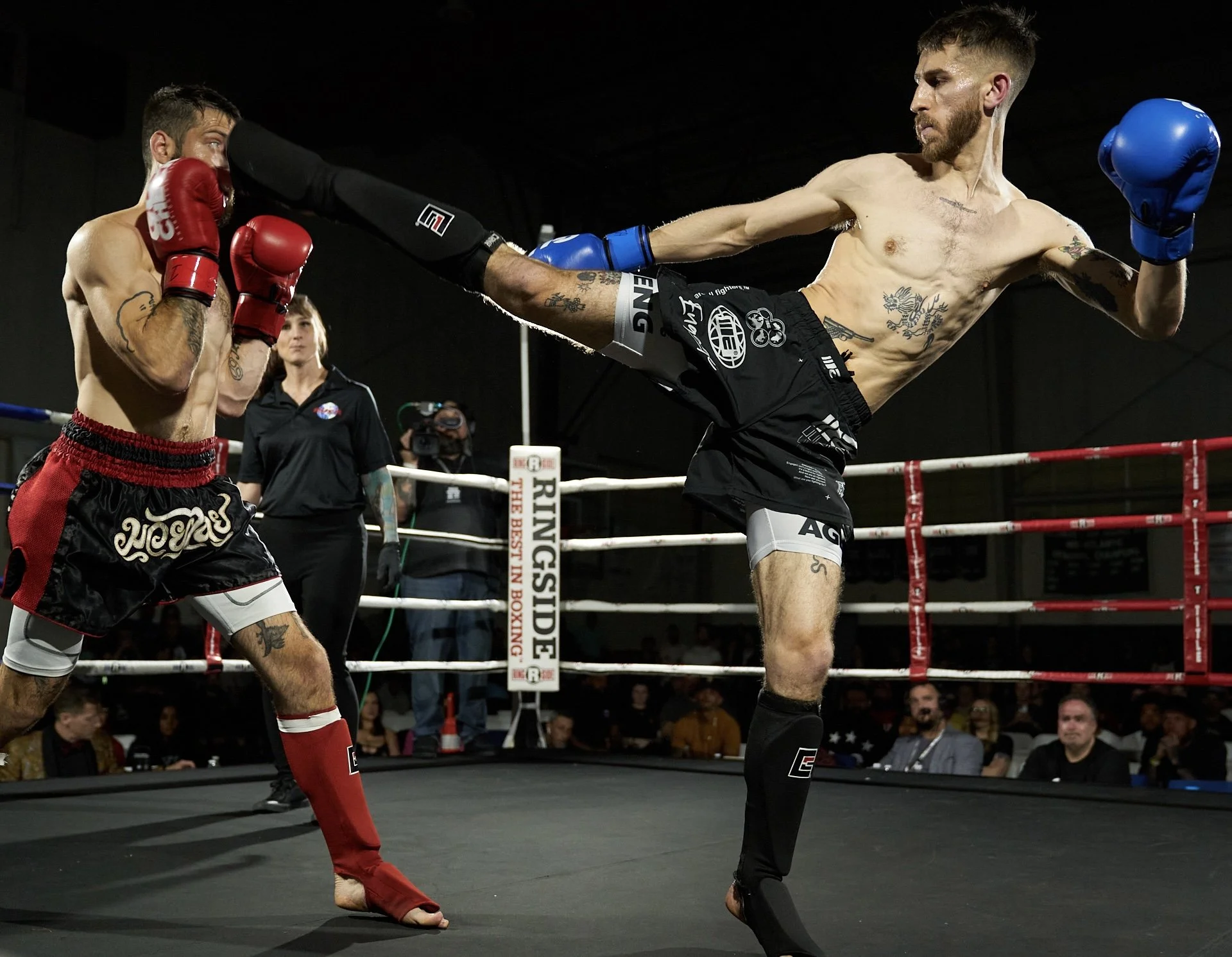 Coach Ben goes for a head kick in a Gutcheck kickboxing fight.