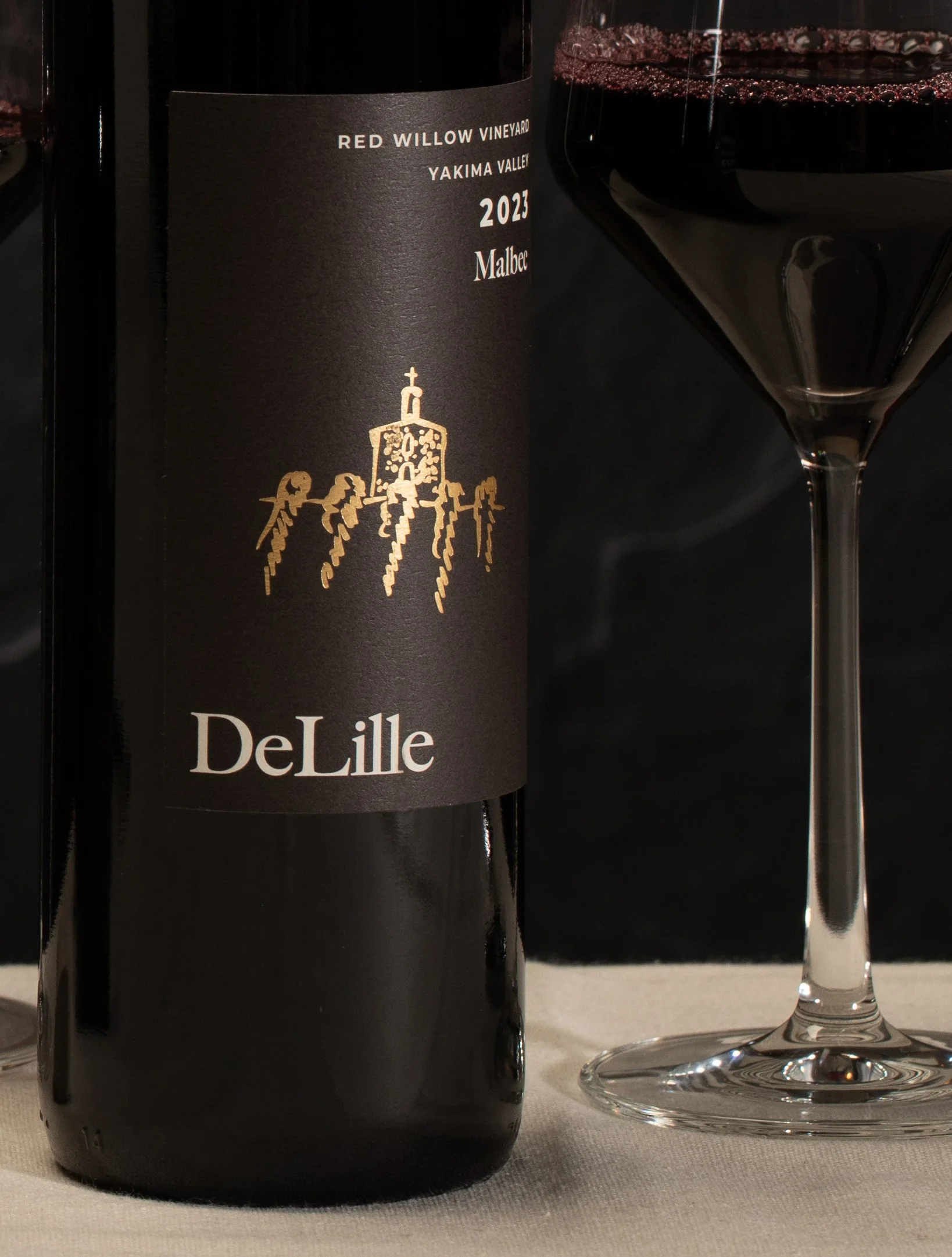 Logo design applied to beautiful wine label design across DeLille wine tiers, including custom illustrations on the Exclusive tier