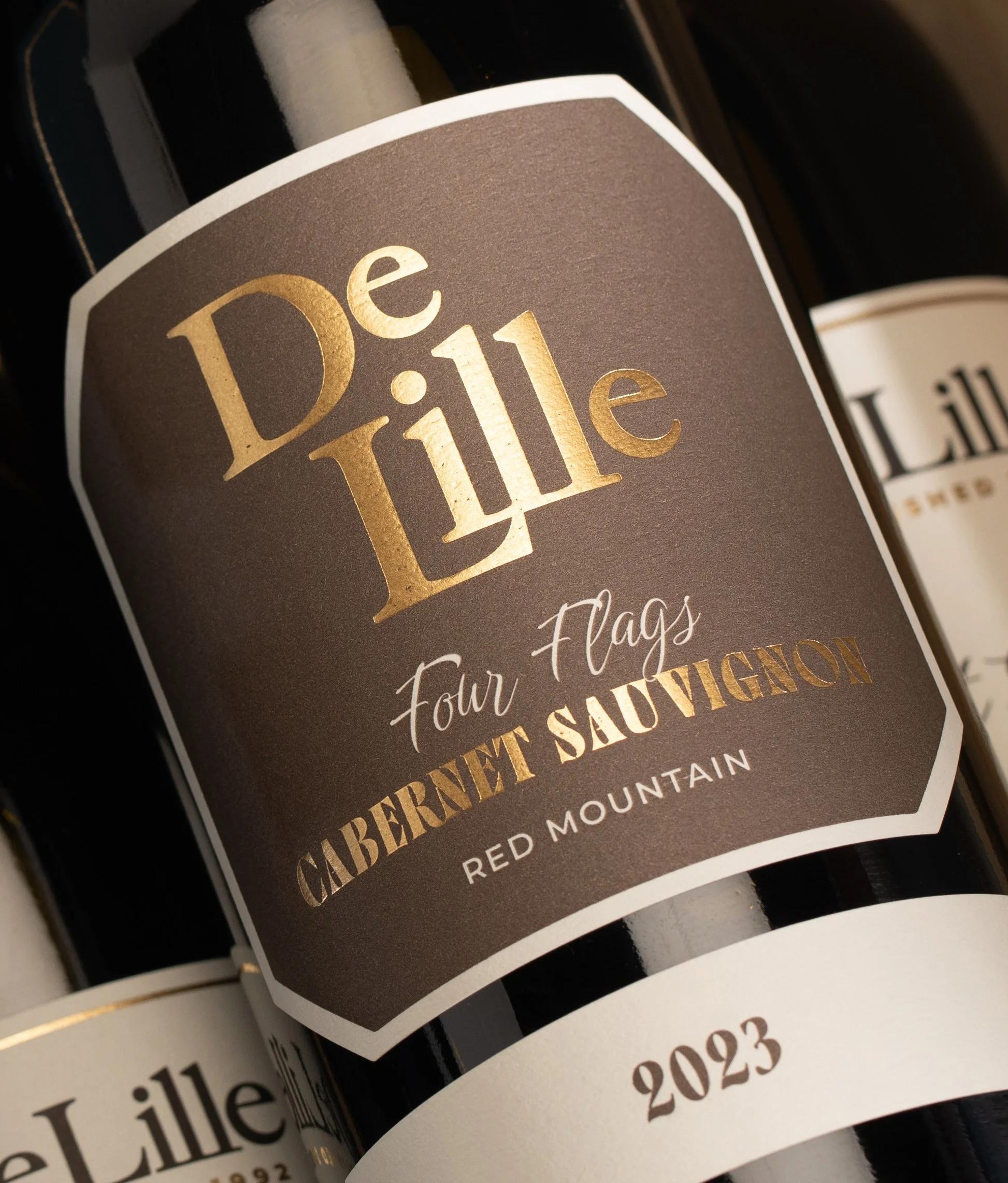 Branding & Packaging Design for DeLille Cellars. Project included brand strategy, positioning, brand guidelines & asset development and wine label / packaging design.
