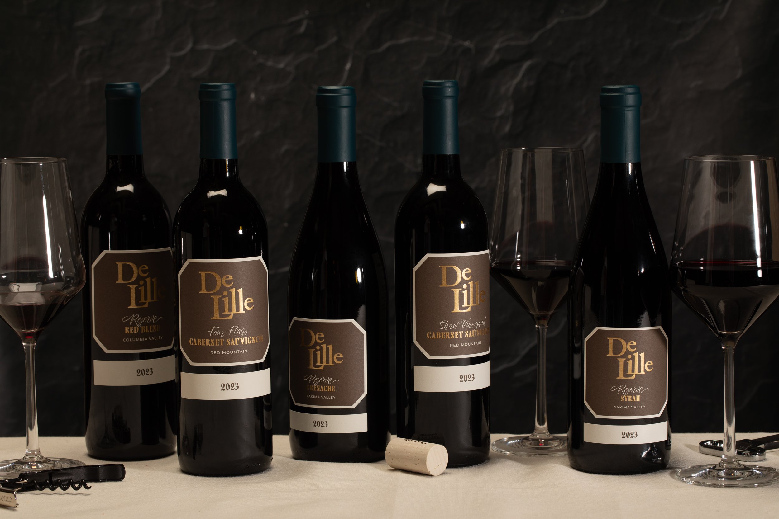 Branding & Packaging Design for DeLille Cellars. Project included brand strategy, positioning, brand guidelines & asset development and wine label / packaging design.