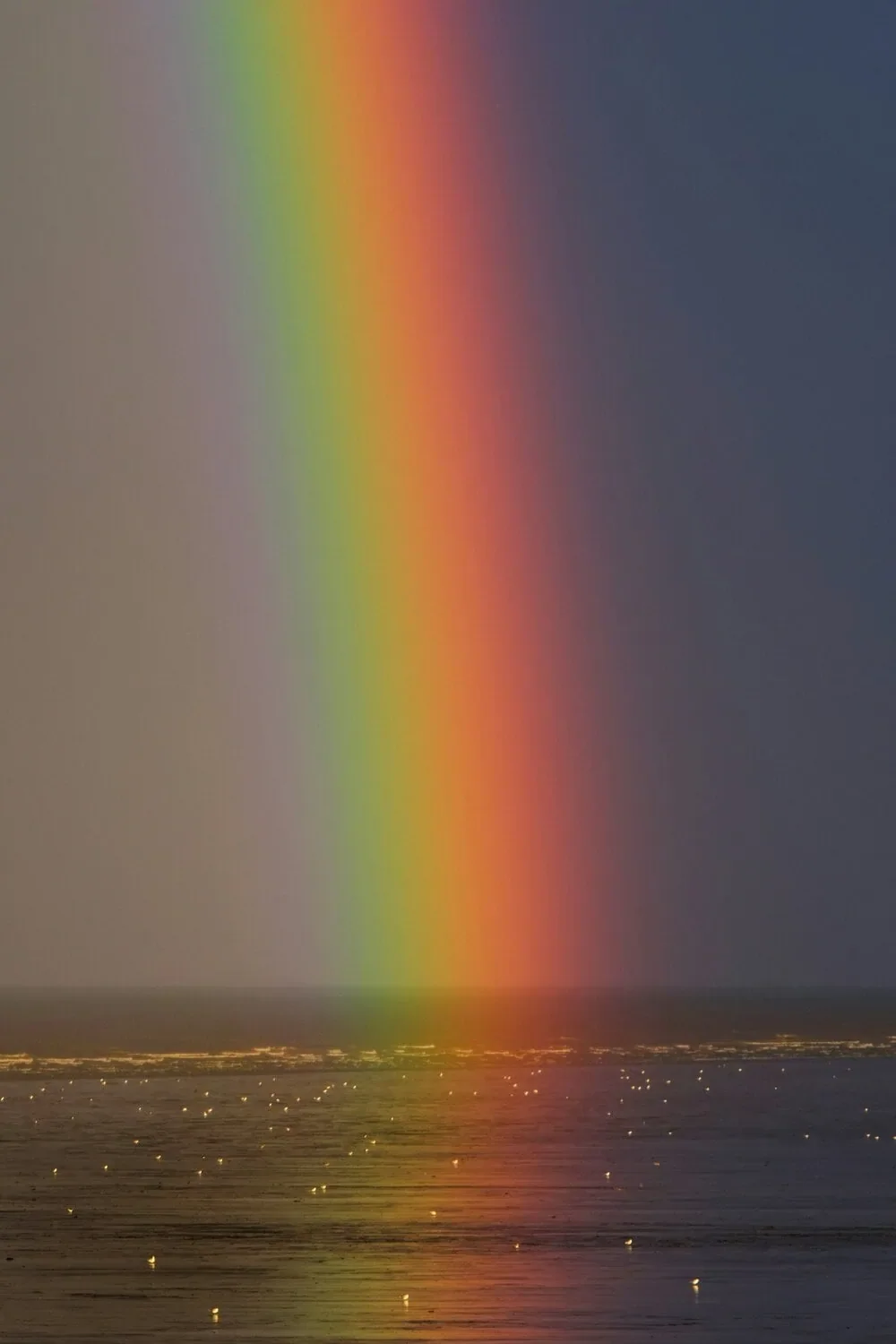 rainbow across the ocean