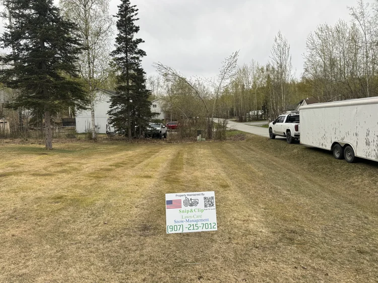 Snip&Clip Alaska mowing sign in a Wasilla yard