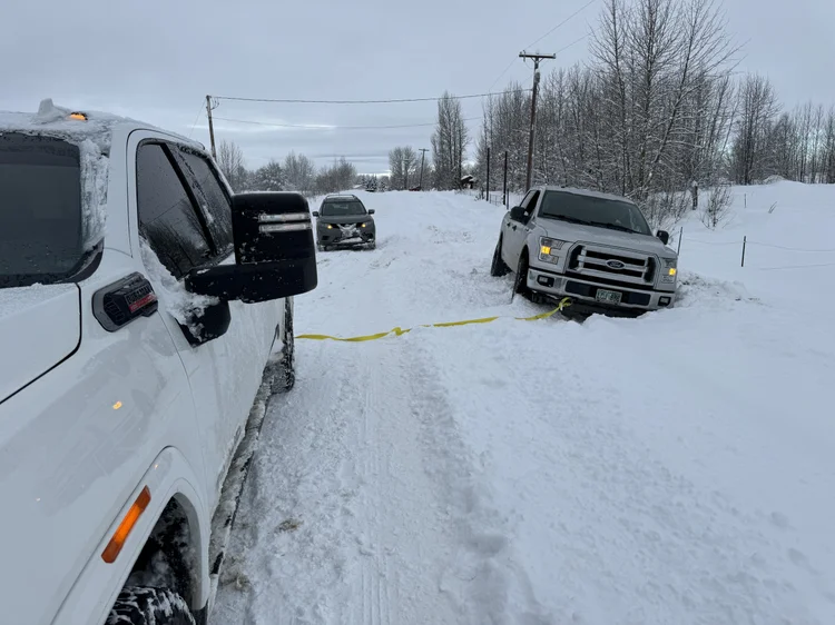 Snip&Clip Alaska pulling a stuck truck out in the Butte