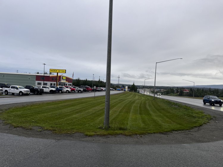 Commercial mowing at Magnum Motors in Wasilla