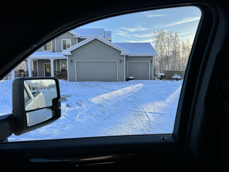 Small residential driveway before plowing service
