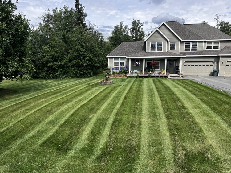 Pristine mowed lawn by Snip&Clip Alaska