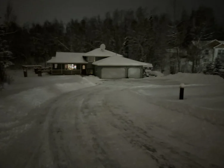 Steep driveway maintained by Snip&Clip Alaska